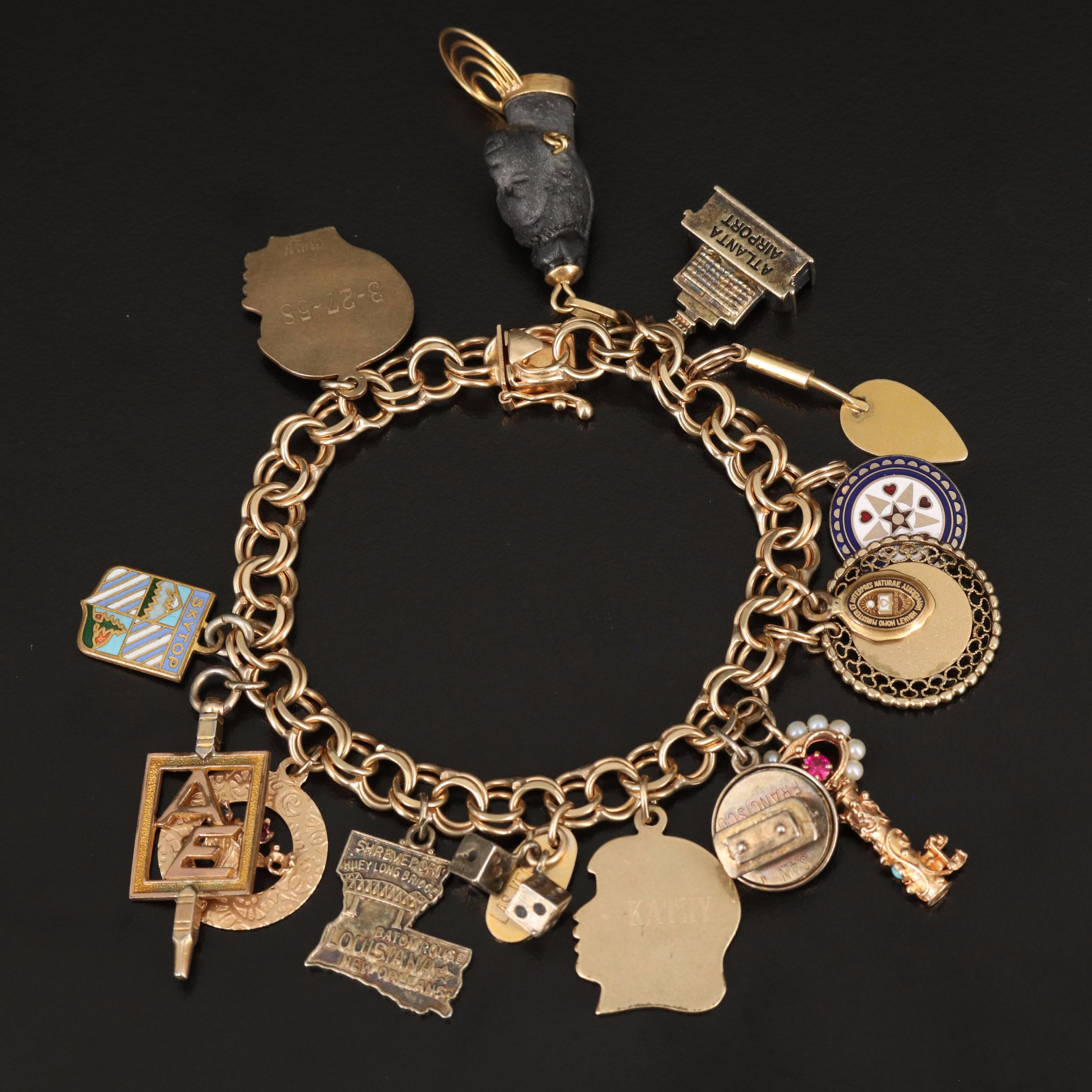 14K Charm Bracelet with Key, Dice and Louisiana Charms