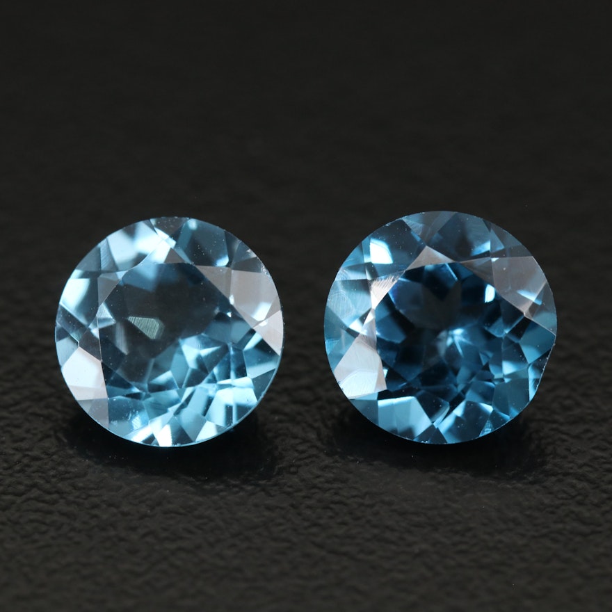 Matched Pair of Loose 6.38 CTW Round Faceted Blue Topaz