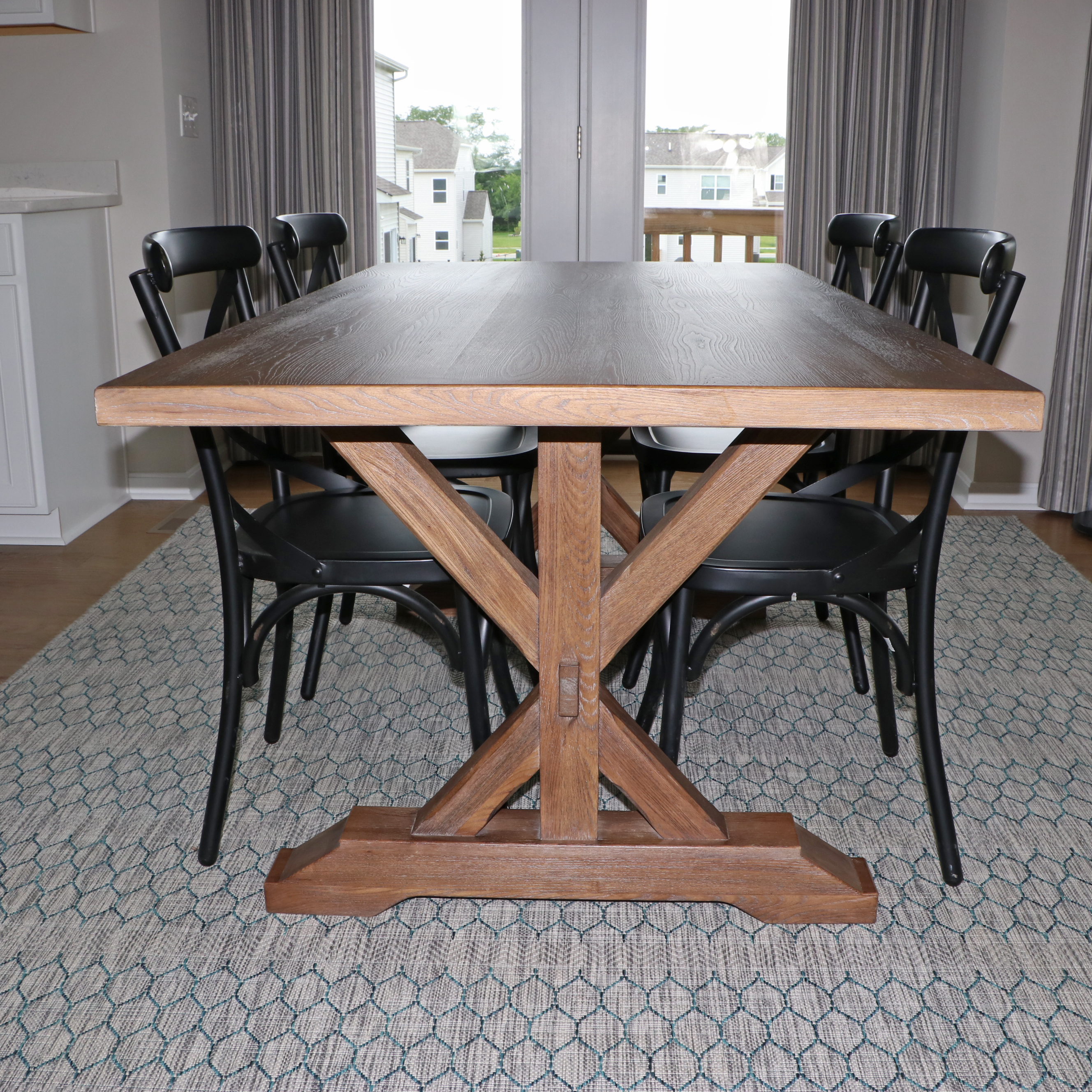 E. & E. Company Wooden Trestle Dining Table and Metal Side Chairs