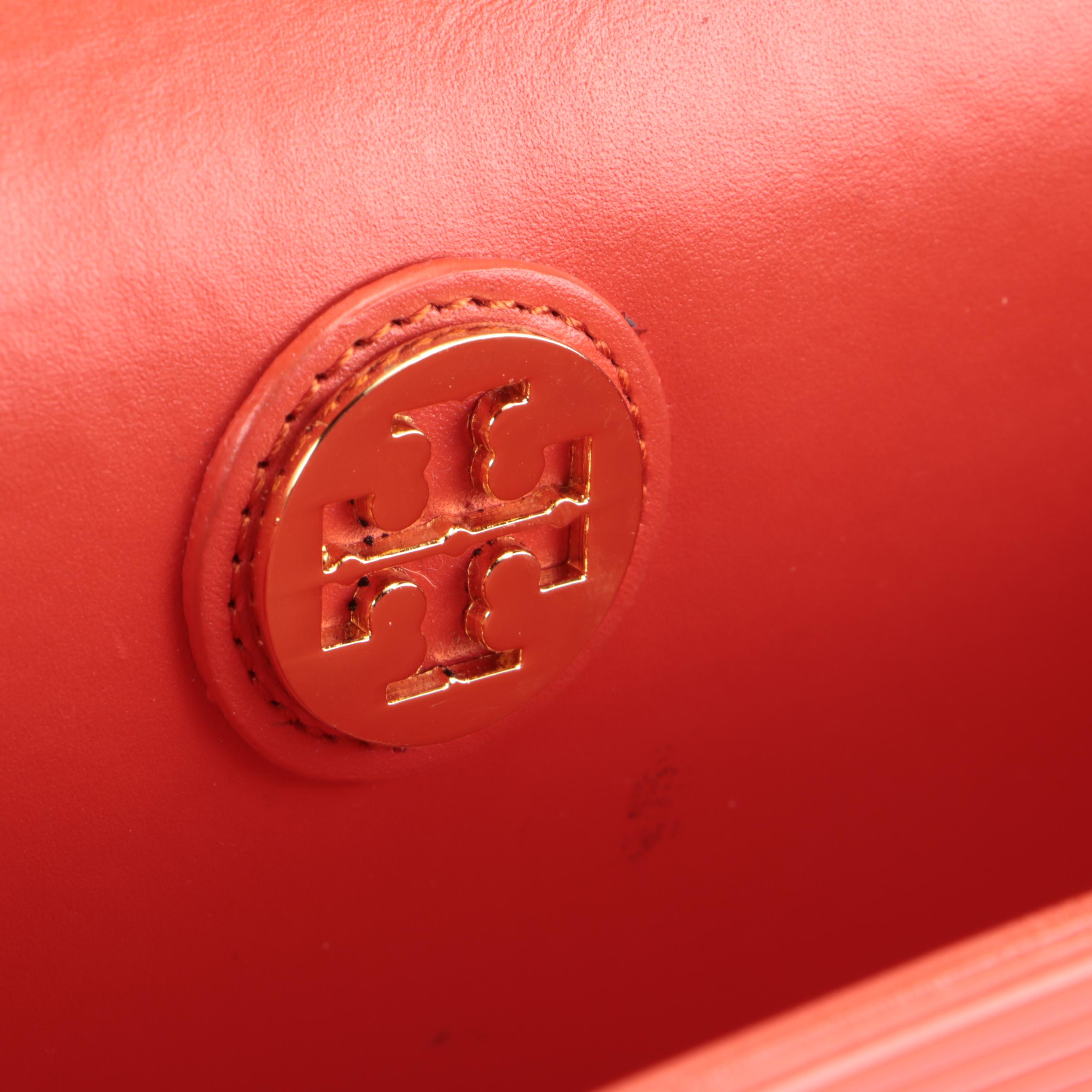 Tory Burch Orange Ribbed Clutch