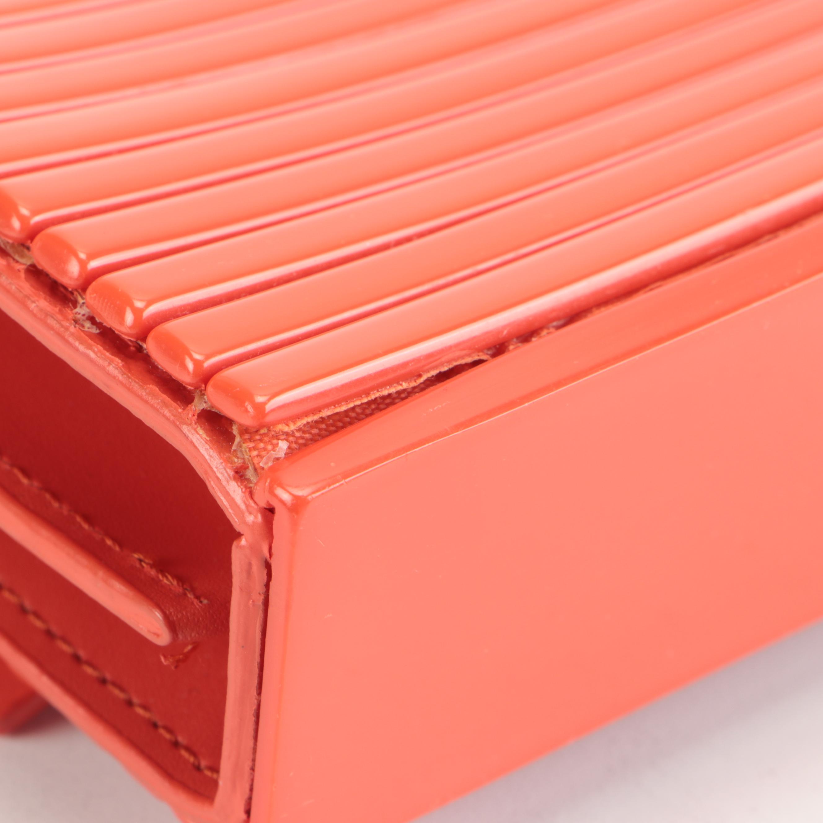 Tory Burch Orange Ribbed Clutch