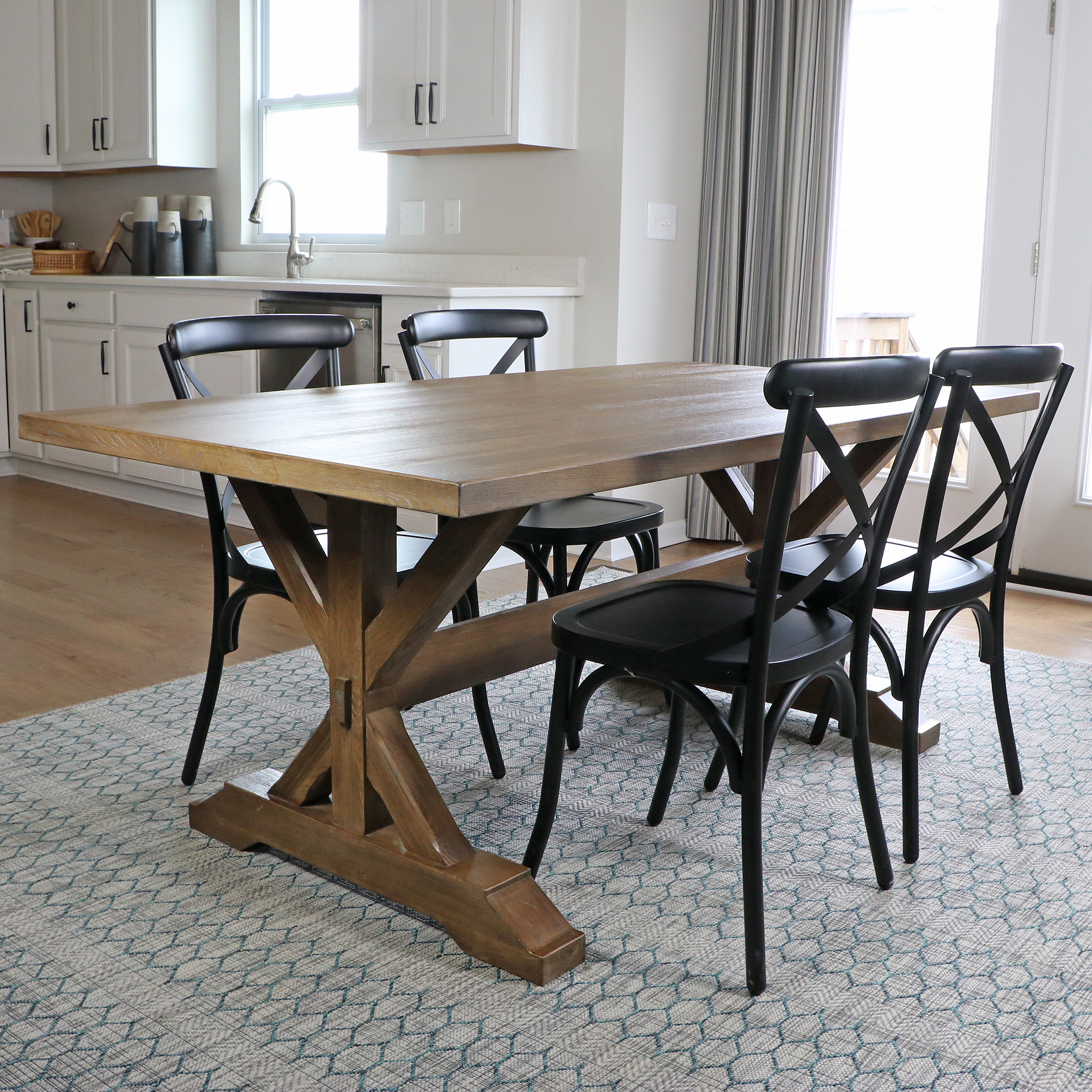 E. & E. Company Wooden Trestle Dining Table and Metal Side Chairs