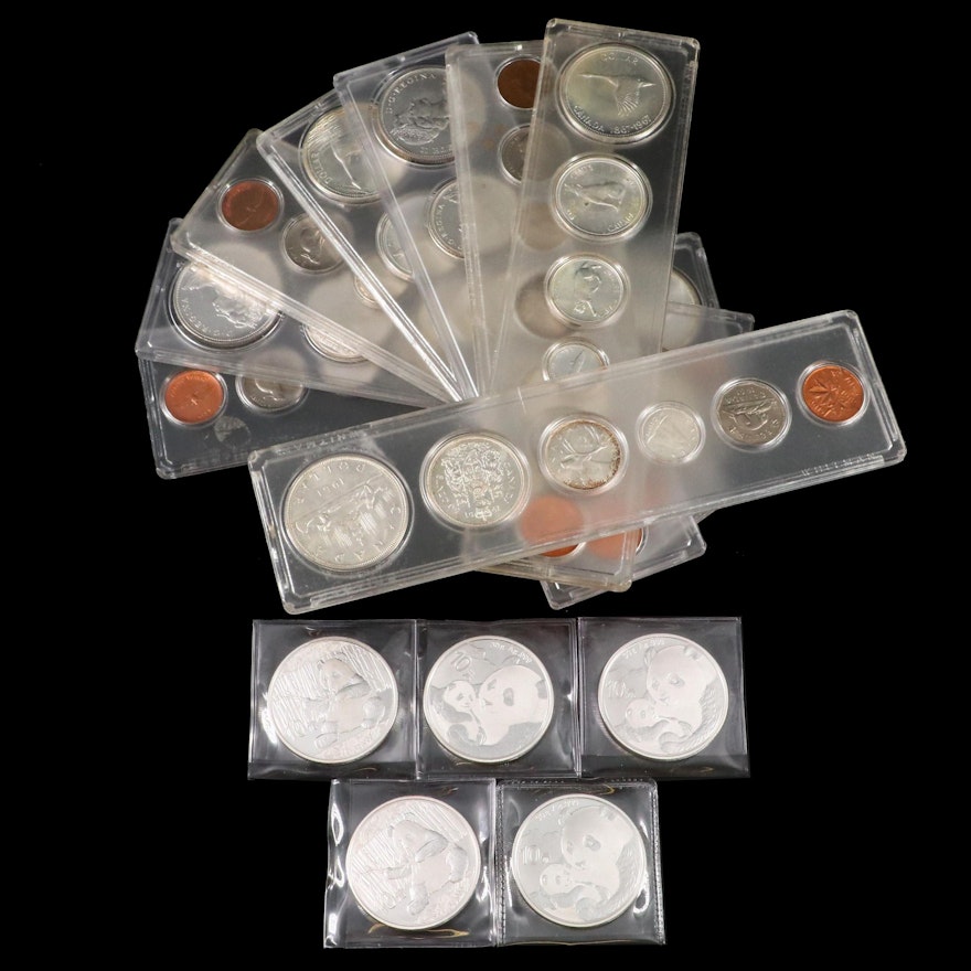 Eight Canadian Coin Sets and Five Chinese Silver Panda Coins