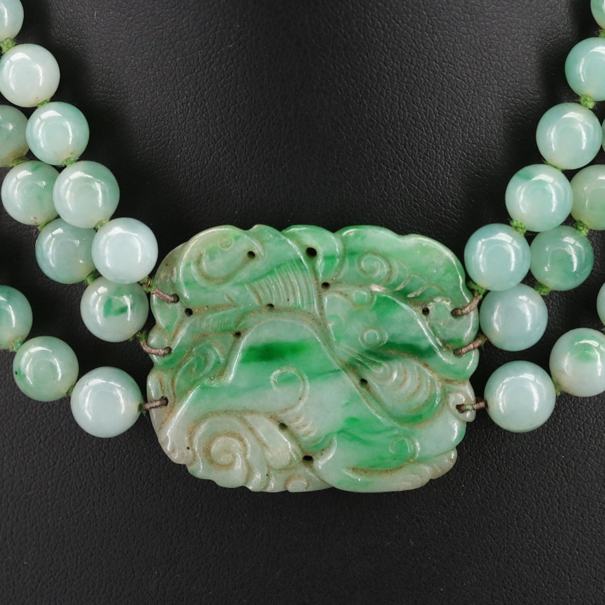 Graduated Multi Strand Jadeite Necklace with Carved Pendant