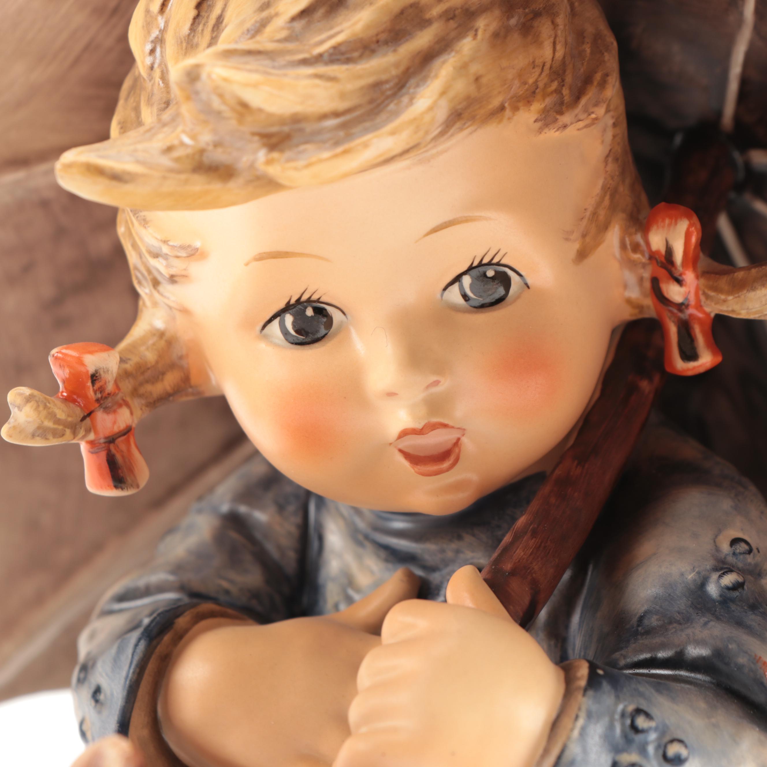 Goebel "Umbrella Girl" and "Umbrella Boy" Porcelain Hummel Figurines