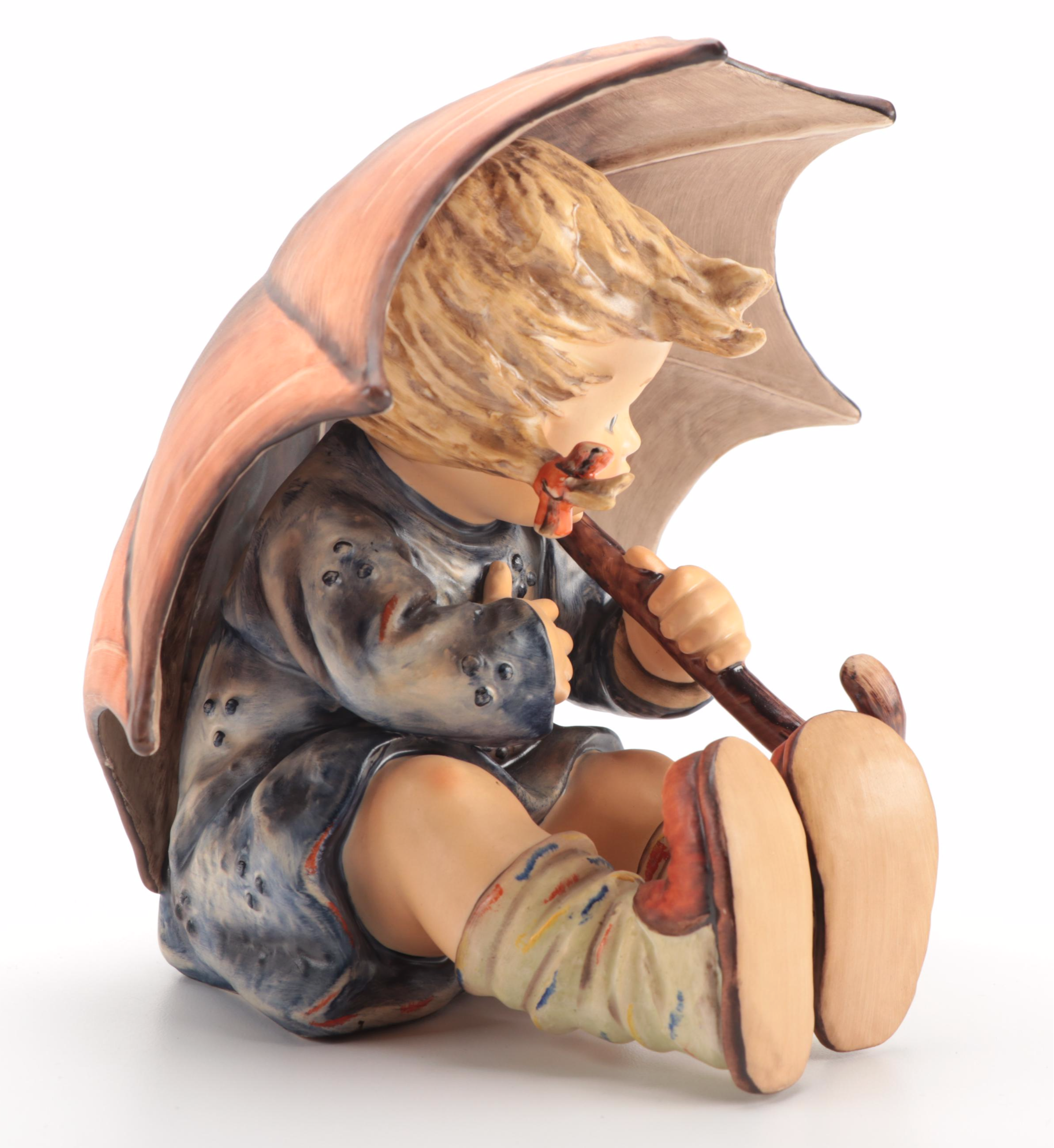 Goebel "Umbrella Girl" and "Umbrella Boy" Porcelain Hummel Figurines