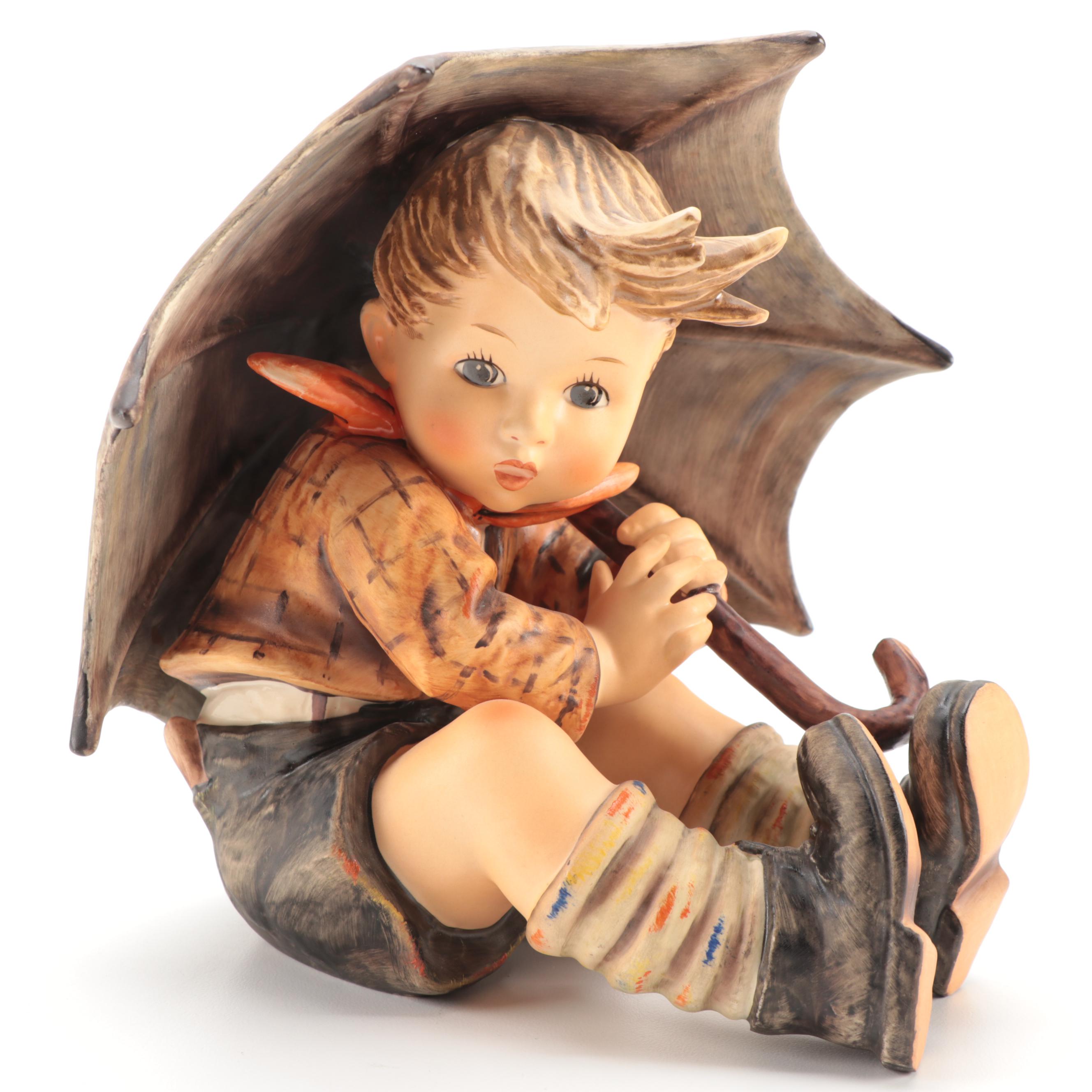 Goebel "Umbrella Girl" and "Umbrella Boy" Porcelain Hummel Figurines