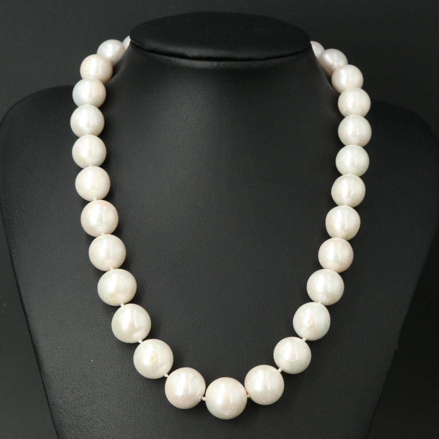 Strand of Near Round Pearls with 14K Closure