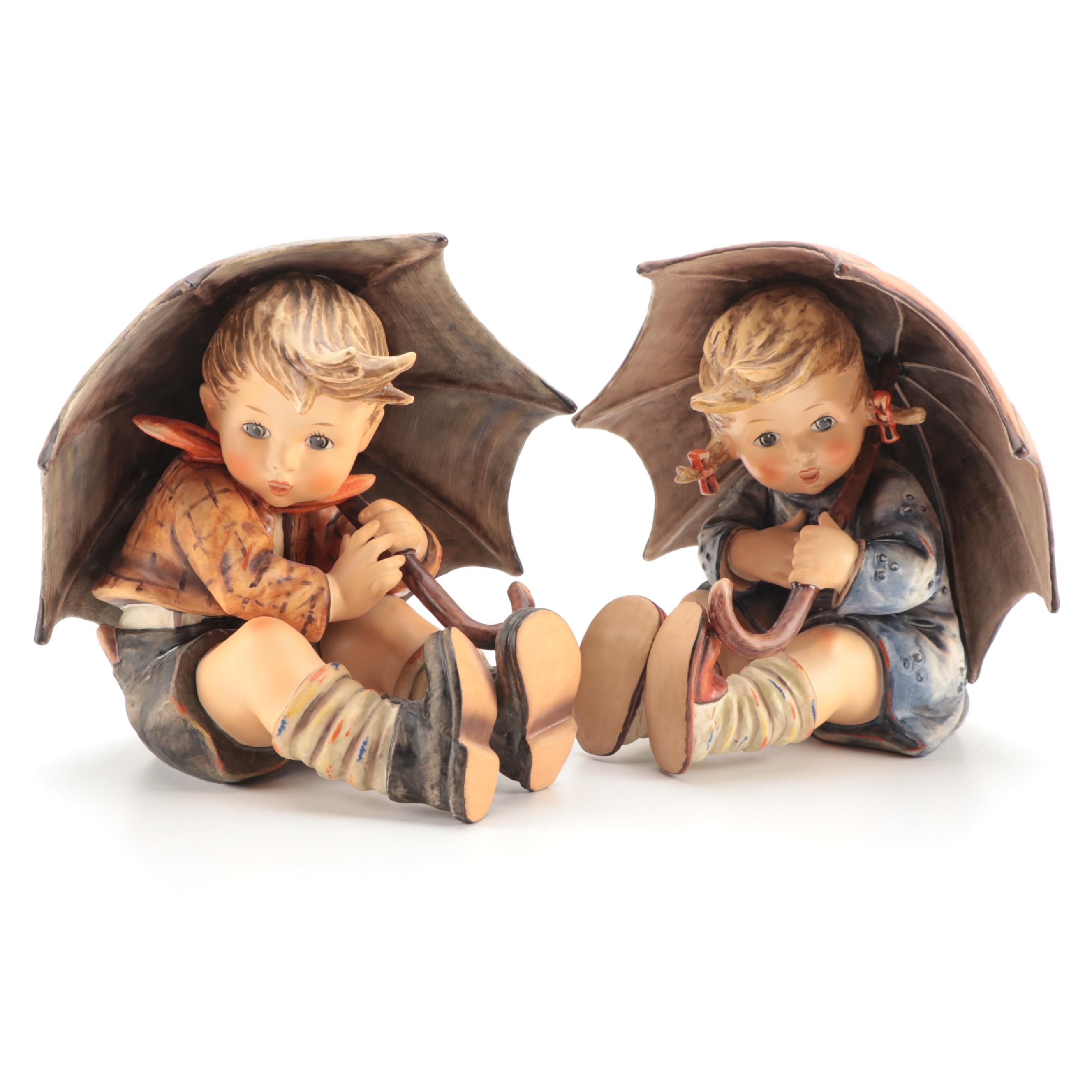 Goebel "Umbrella Girl" and "Umbrella Boy" Porcelain Hummel Figurines