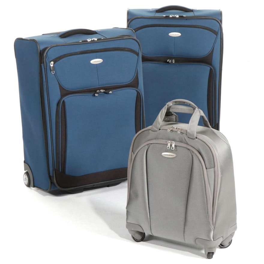 Three Samsonite Rolling Suitcases