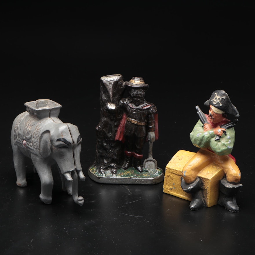 Vintage Cast Metal Coin Banks, Including Elephant and Pirate Forms