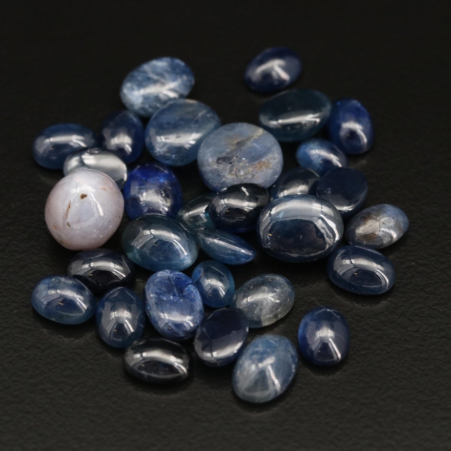 Loose 53.54 CTW Cabochon and Rough Sapphires