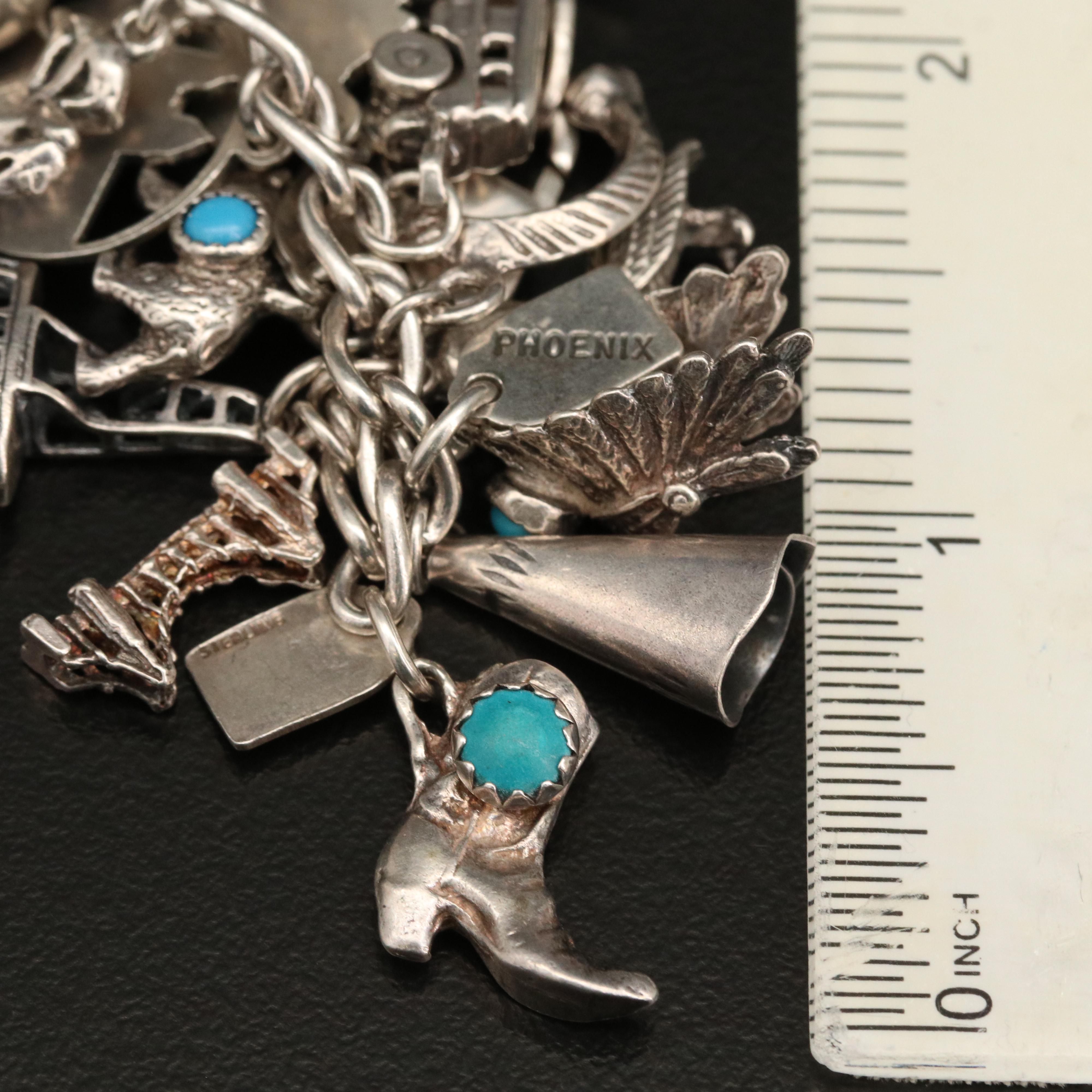 Vintage Sterling Charm Bracelet with Disneyland Castle and Bell Trading Co.