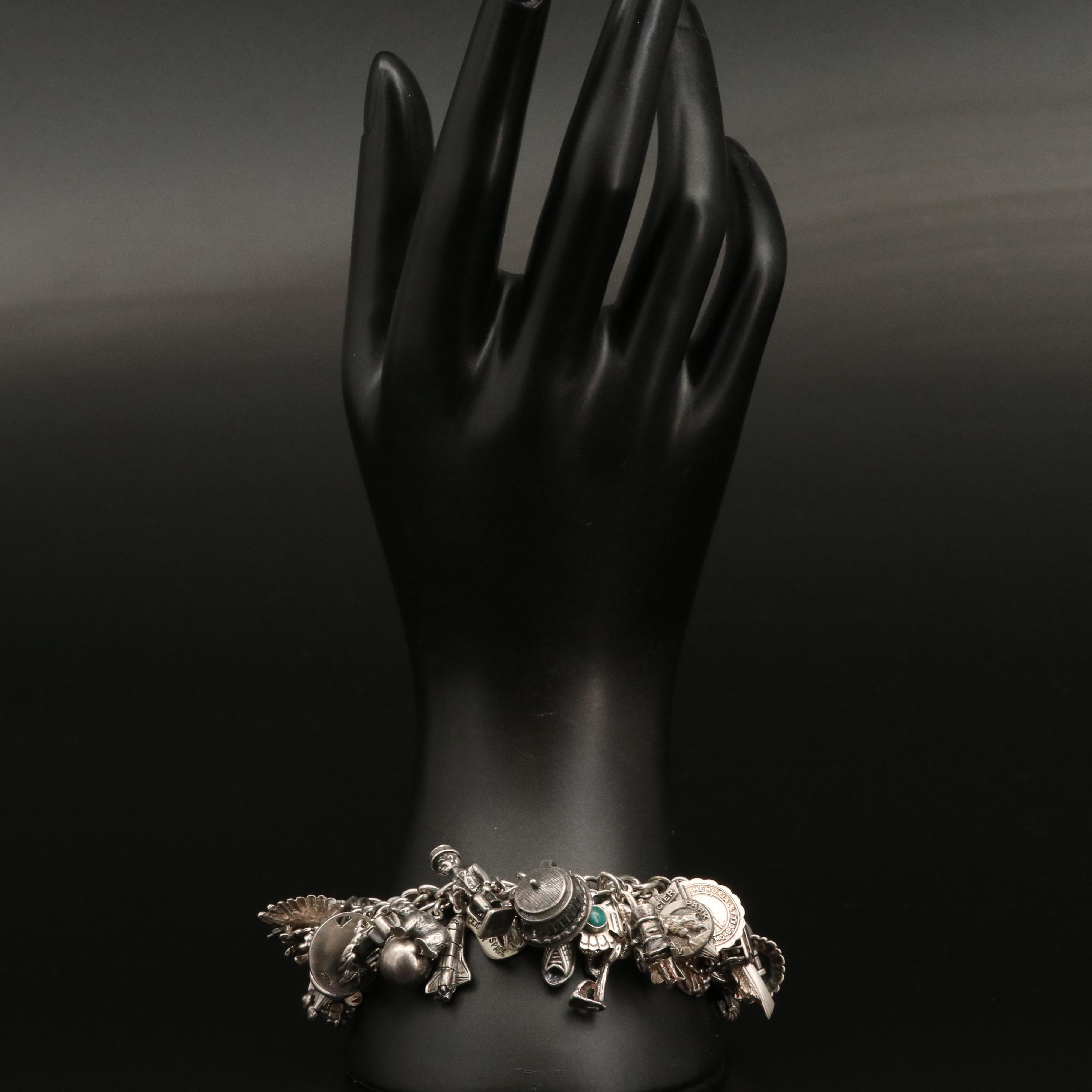 Vintage Sterling Charm Bracelet with Disneyland Castle and Bell Trading Co.