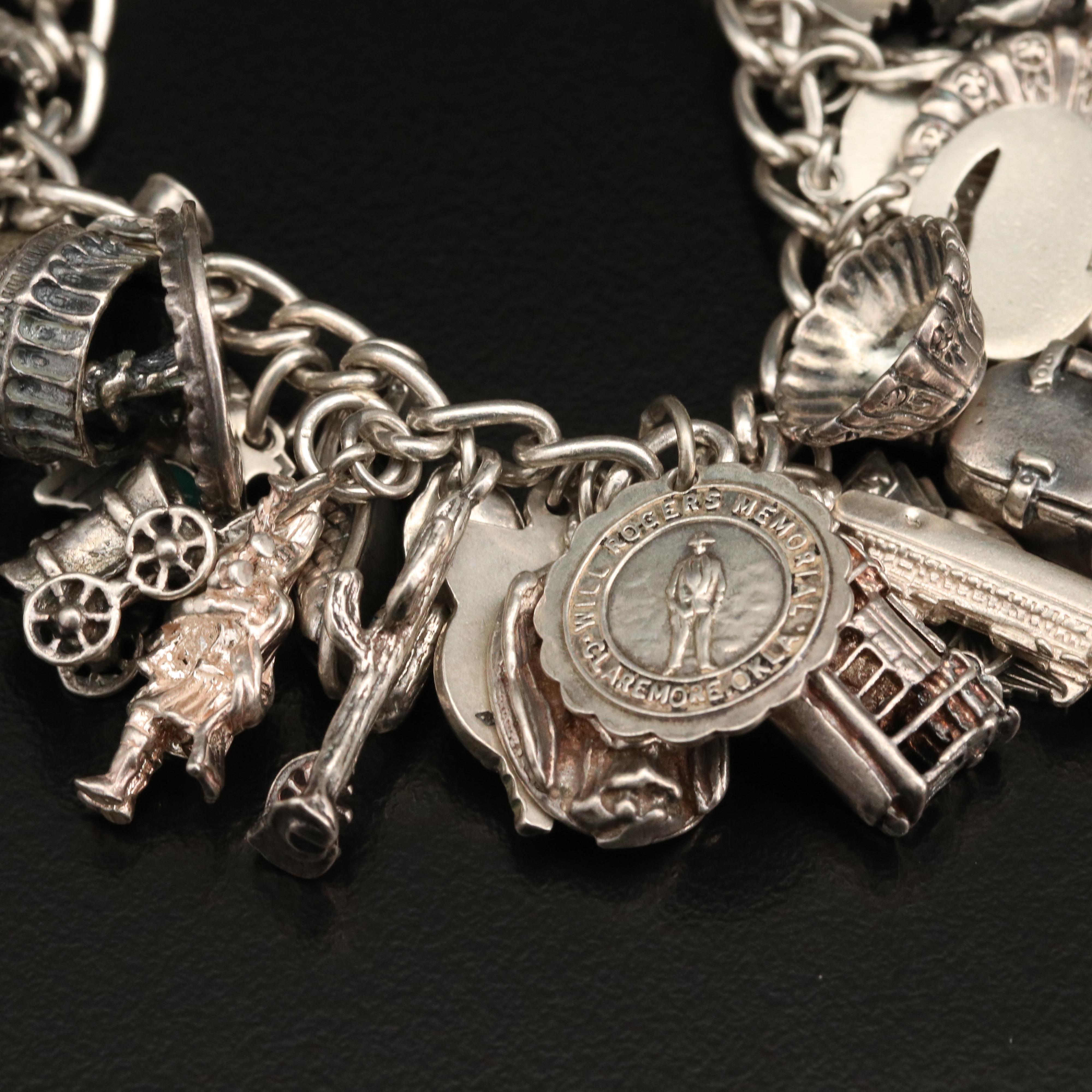 Vintage Sterling Charm Bracelet with Disneyland Castle and Bell Trading Co.