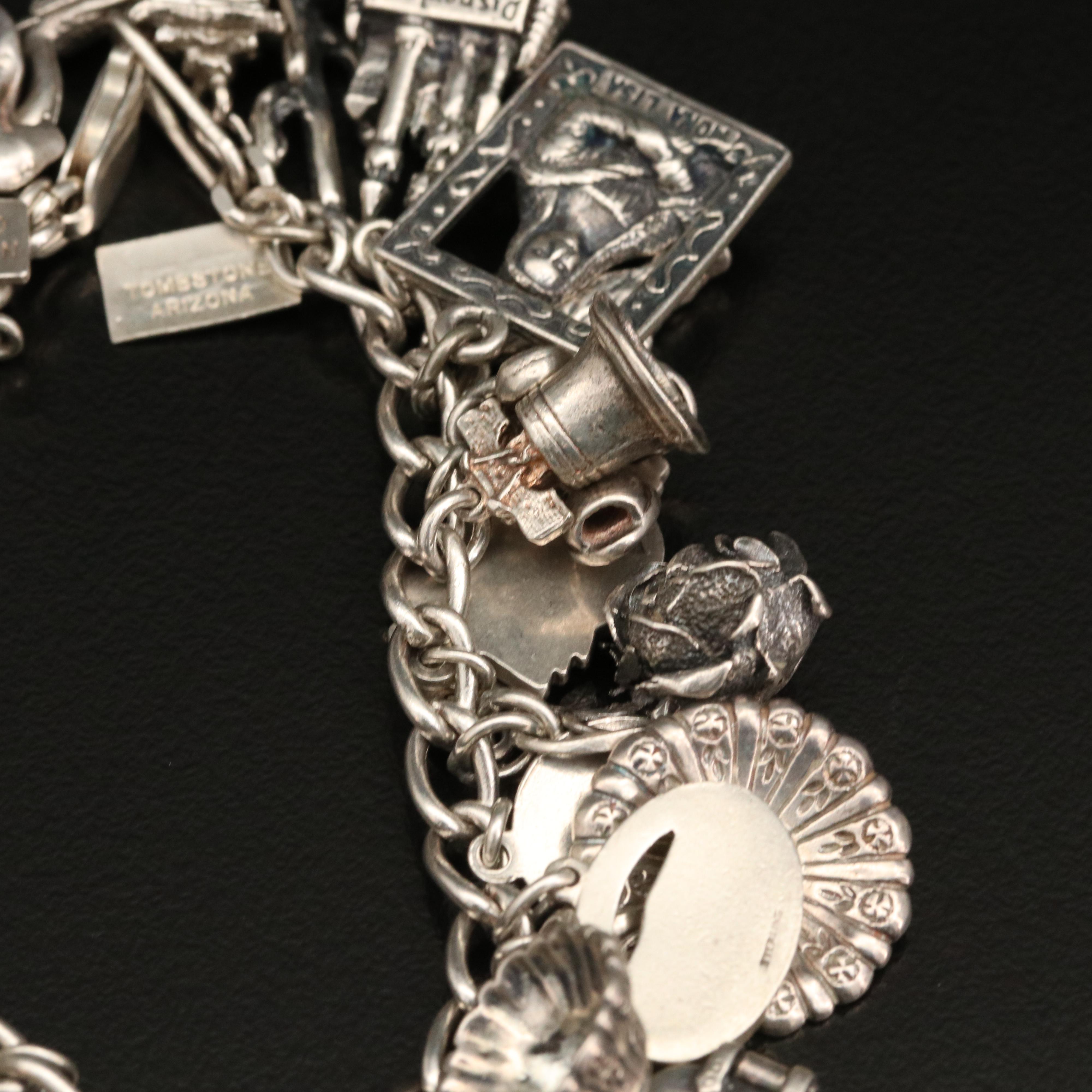 Vintage Sterling Charm Bracelet with Disneyland Castle and Bell Trading Co.