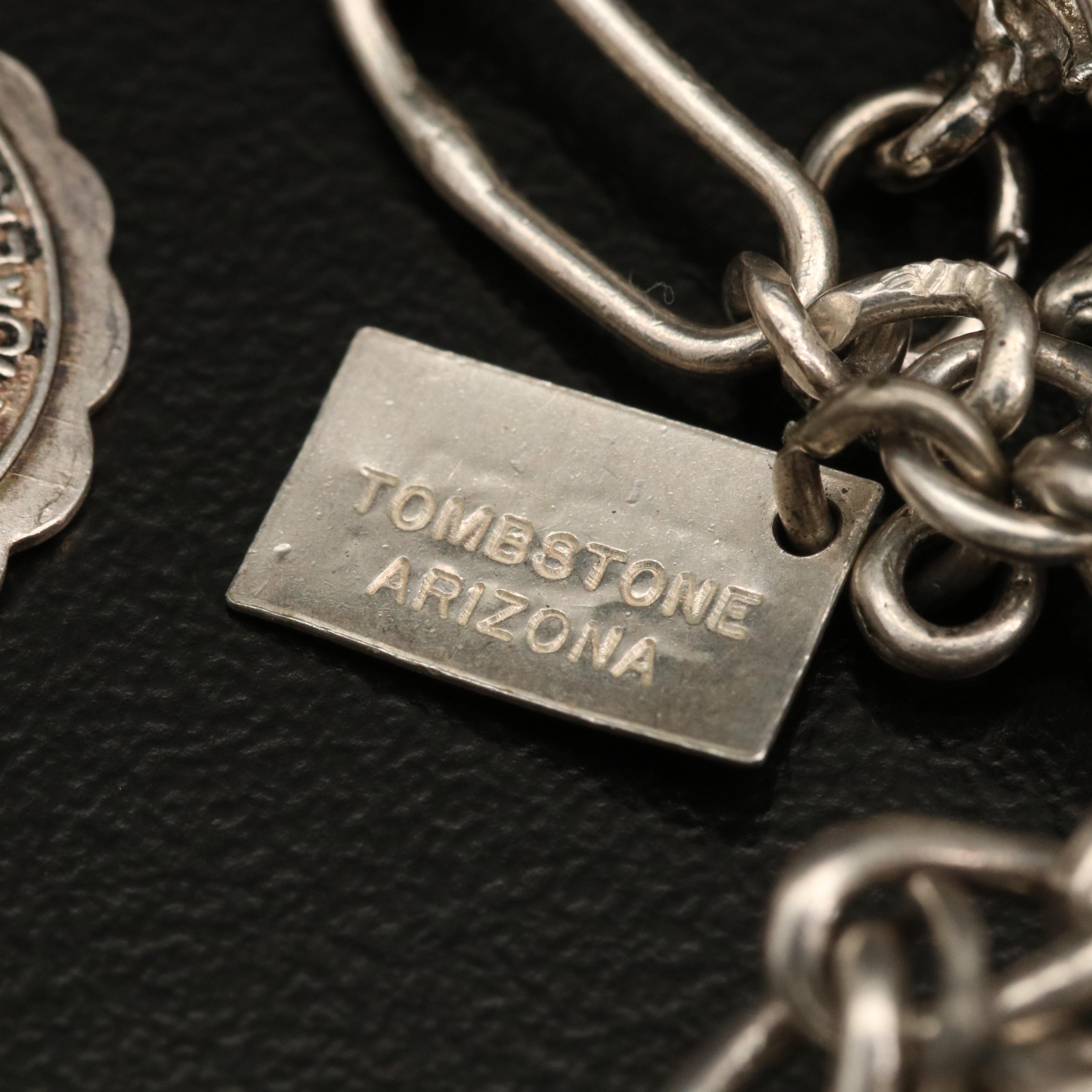 Vintage Sterling Charm Bracelet with Disneyland Castle and Bell Trading Co.