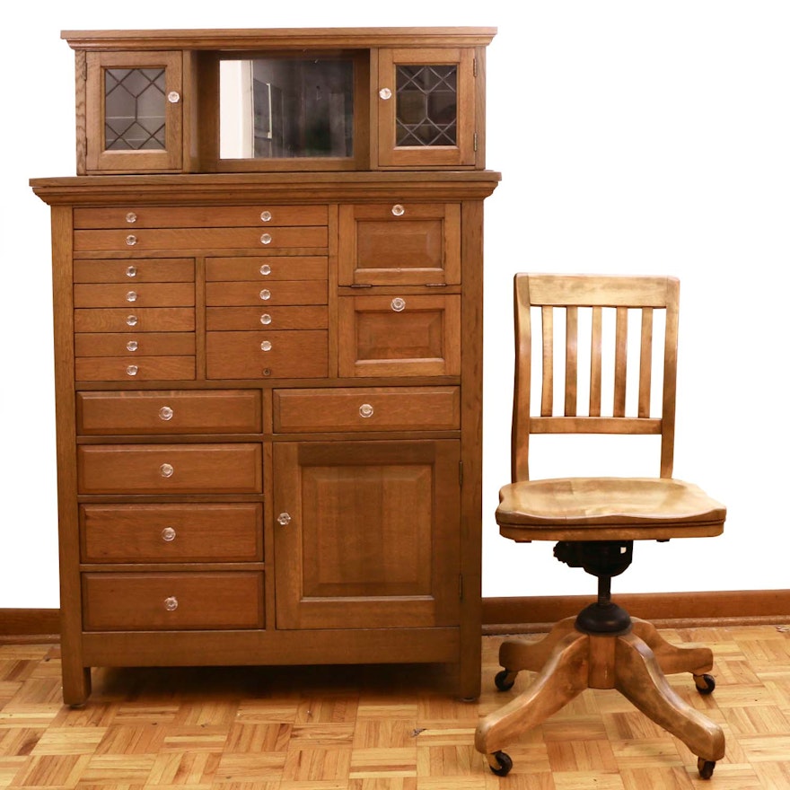 The American Cabinet Co. Oak and Leaded Glass Dental Cabinet and Desk Chair