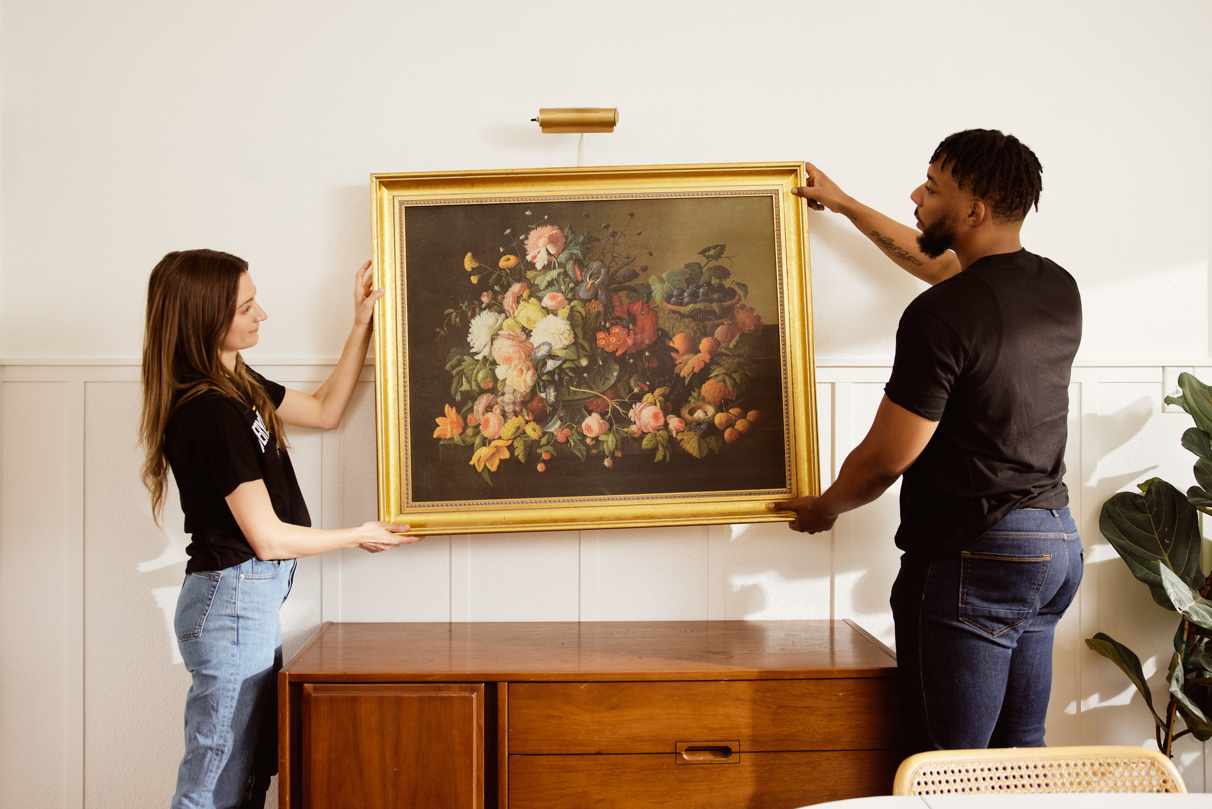 EBTH staff evaluating artwork