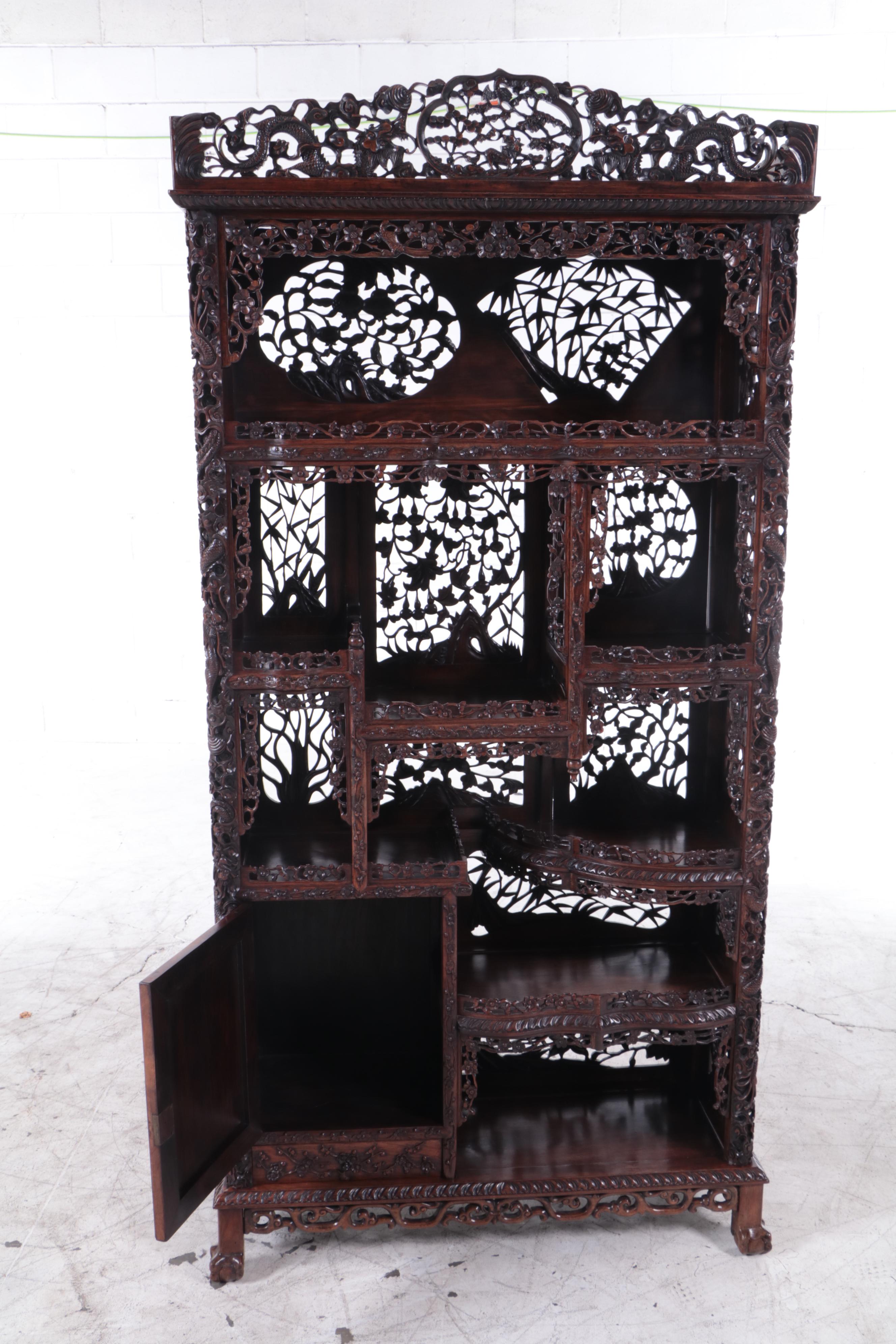 Chinese Pierced and Dragon-Carved Rosewood Curio Cabinet