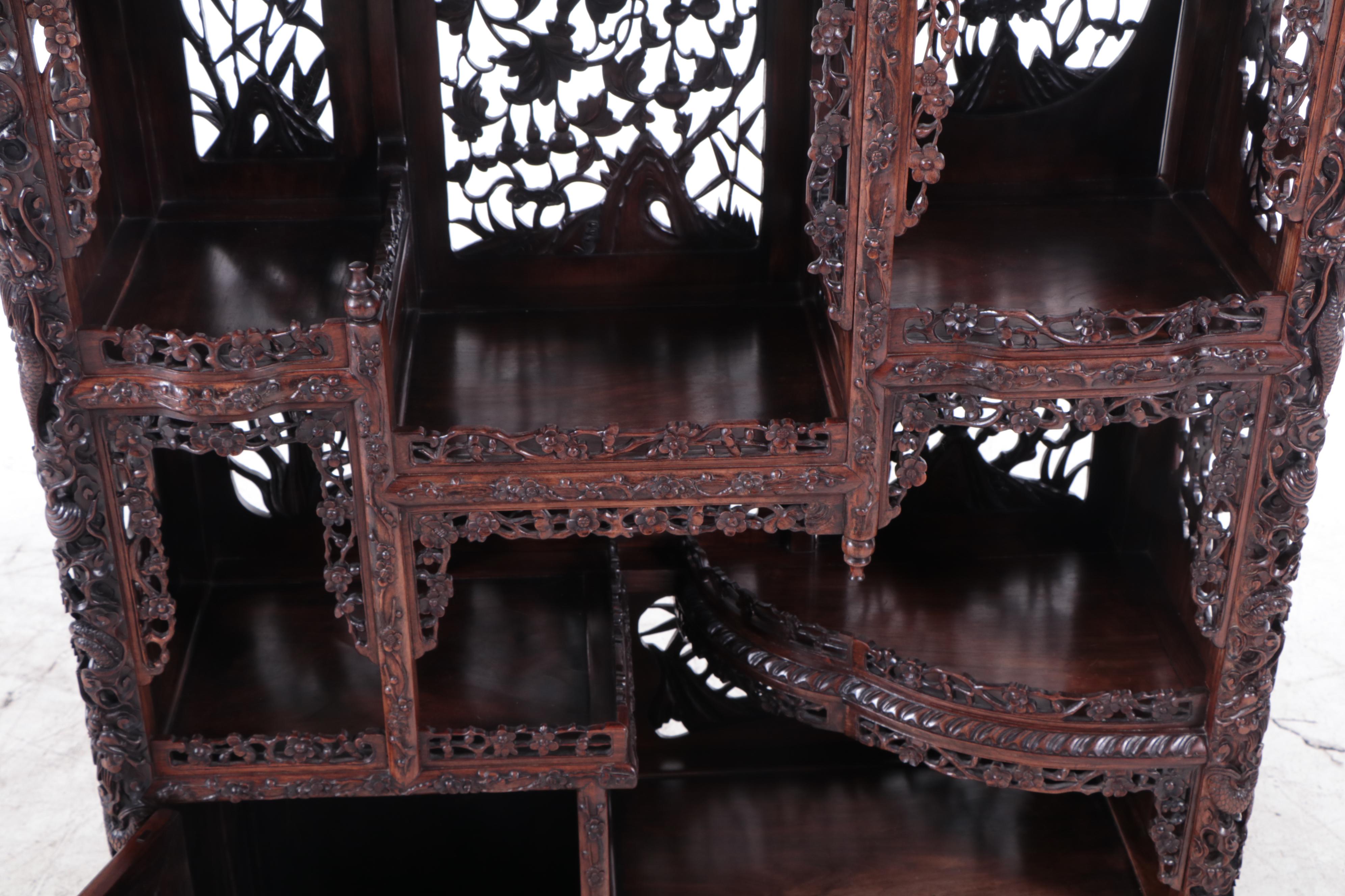 Chinese Pierced and Dragon-Carved Rosewood Curio Cabinet