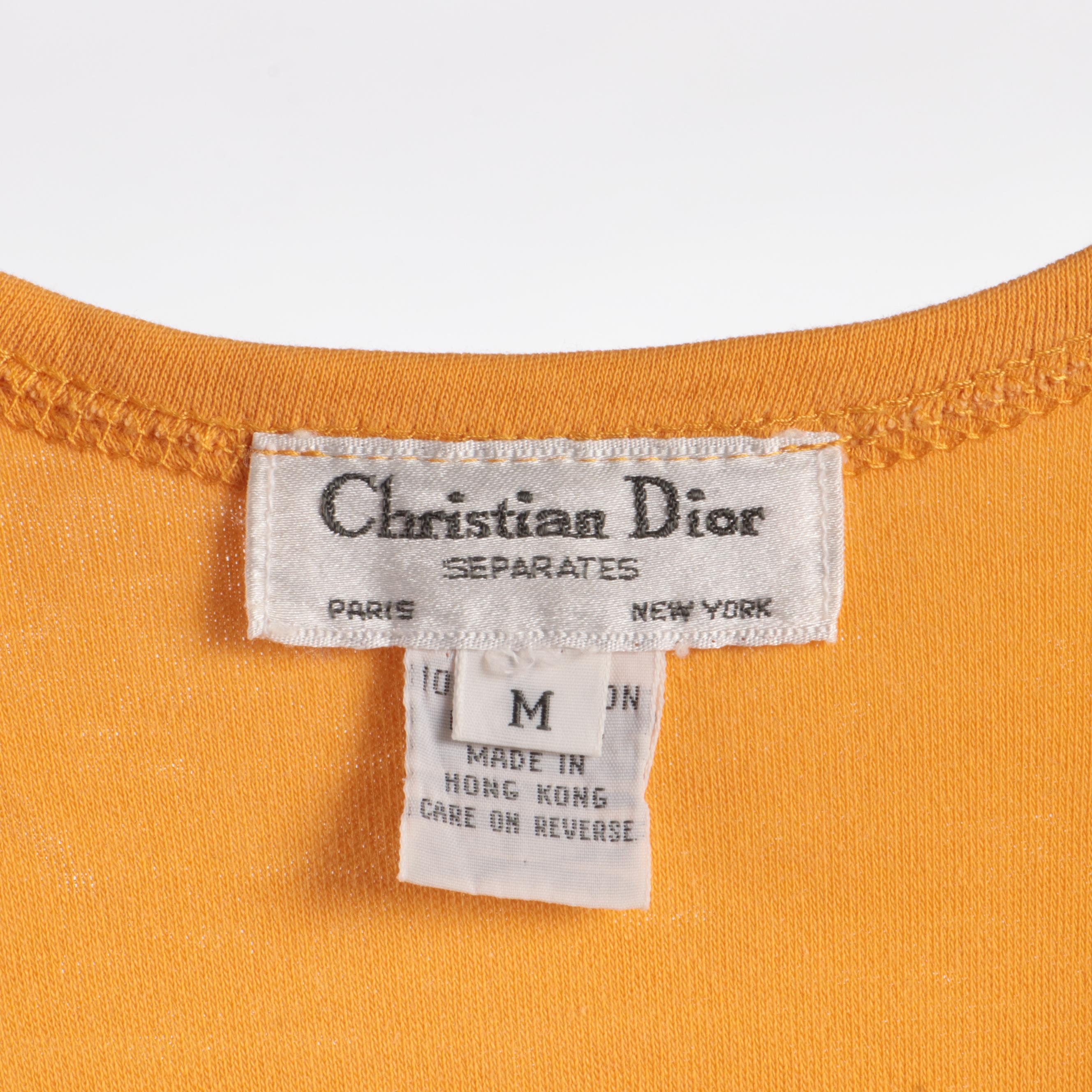 Christian Dior Tank Top, Arnold Scaasi Jumpsuit and Kate Spade Shoulder Bag