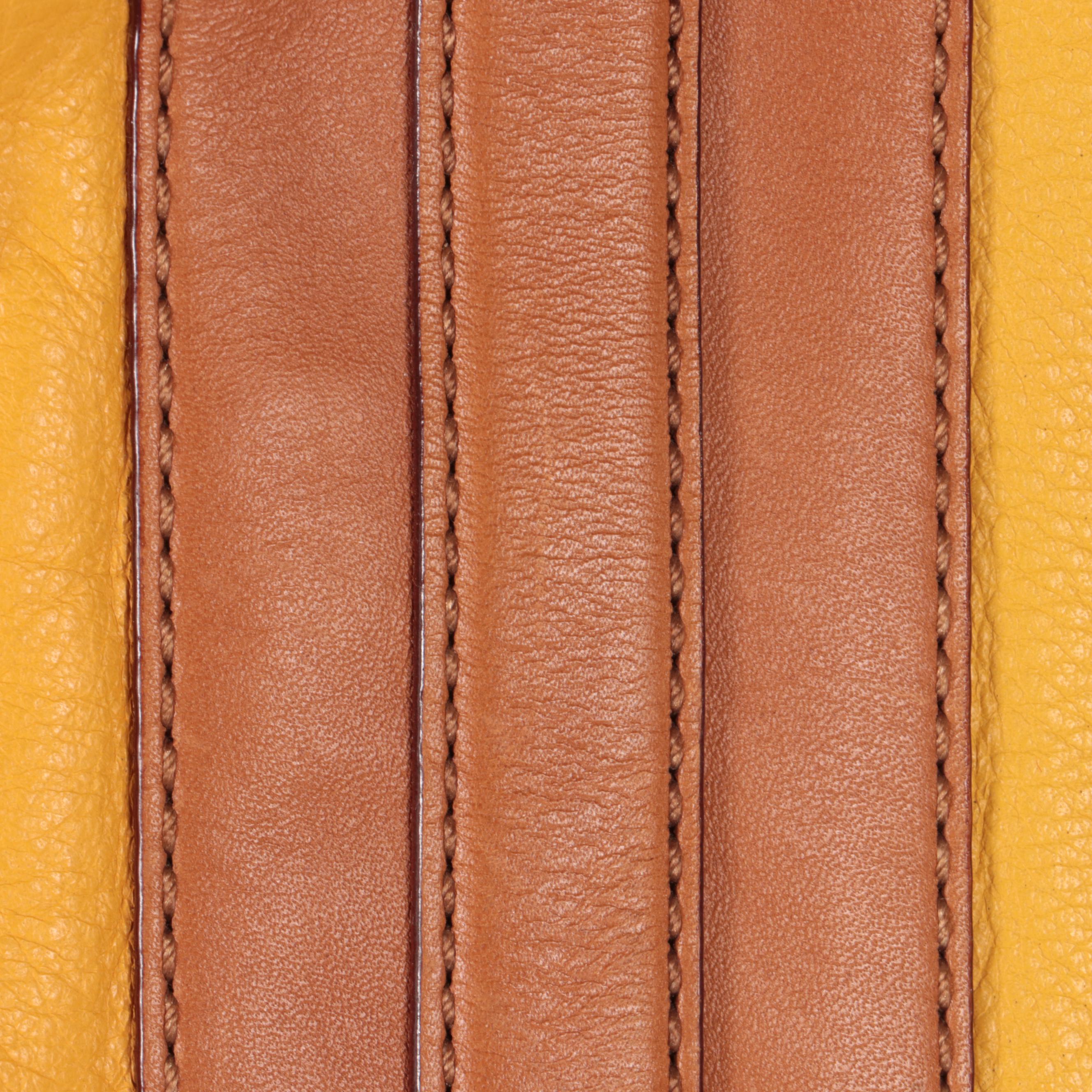 Christian Dior Tank Top, Arnold Scaasi Jumpsuit and Kate Spade Shoulder Bag