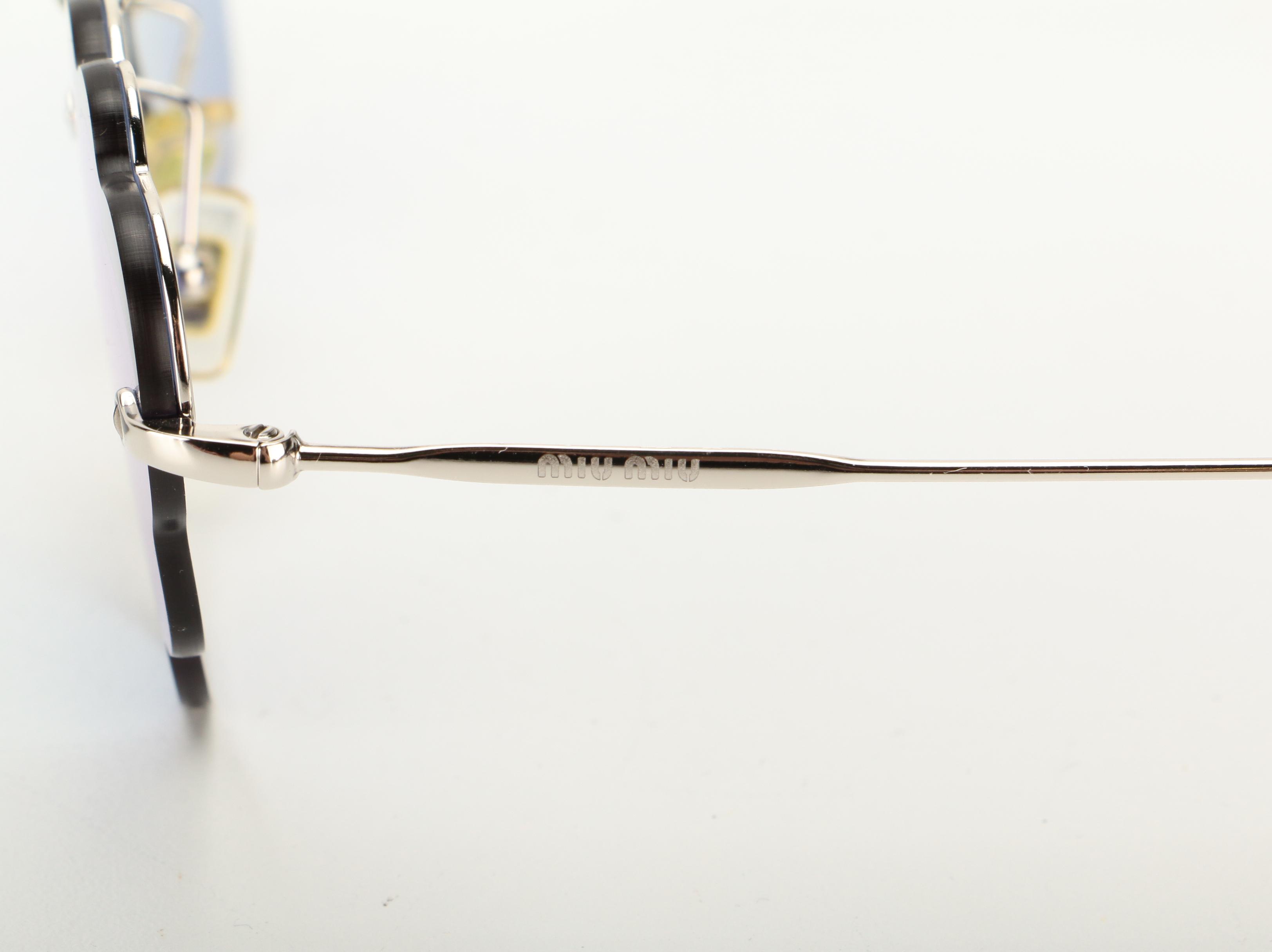 Miu Miu SMU57U Cloud Lens Sunglasses in Blue and Silver Tone Frame