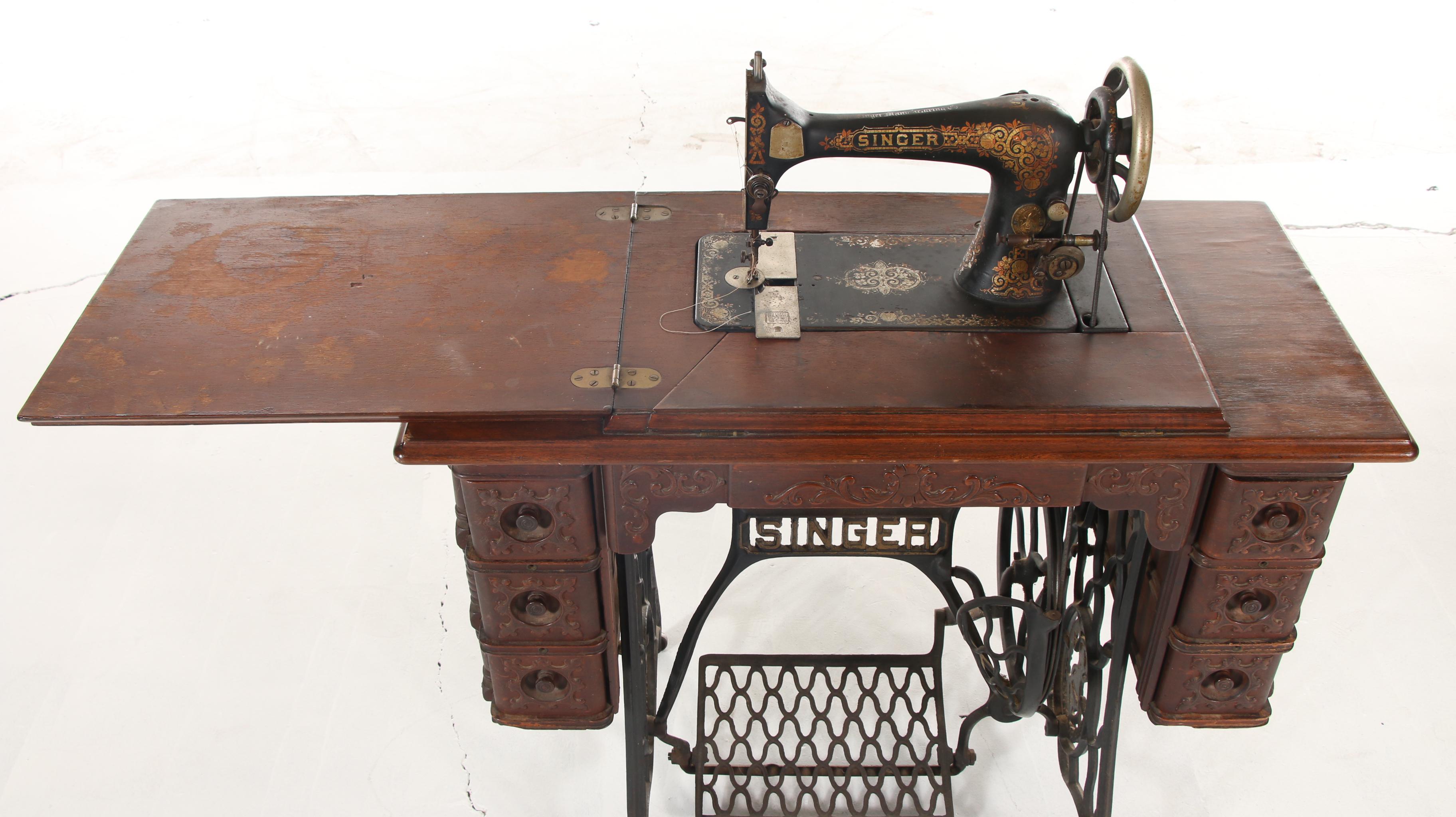 Singer Treadle Sewing Machine on Oak Cabinet, Early 20th Century