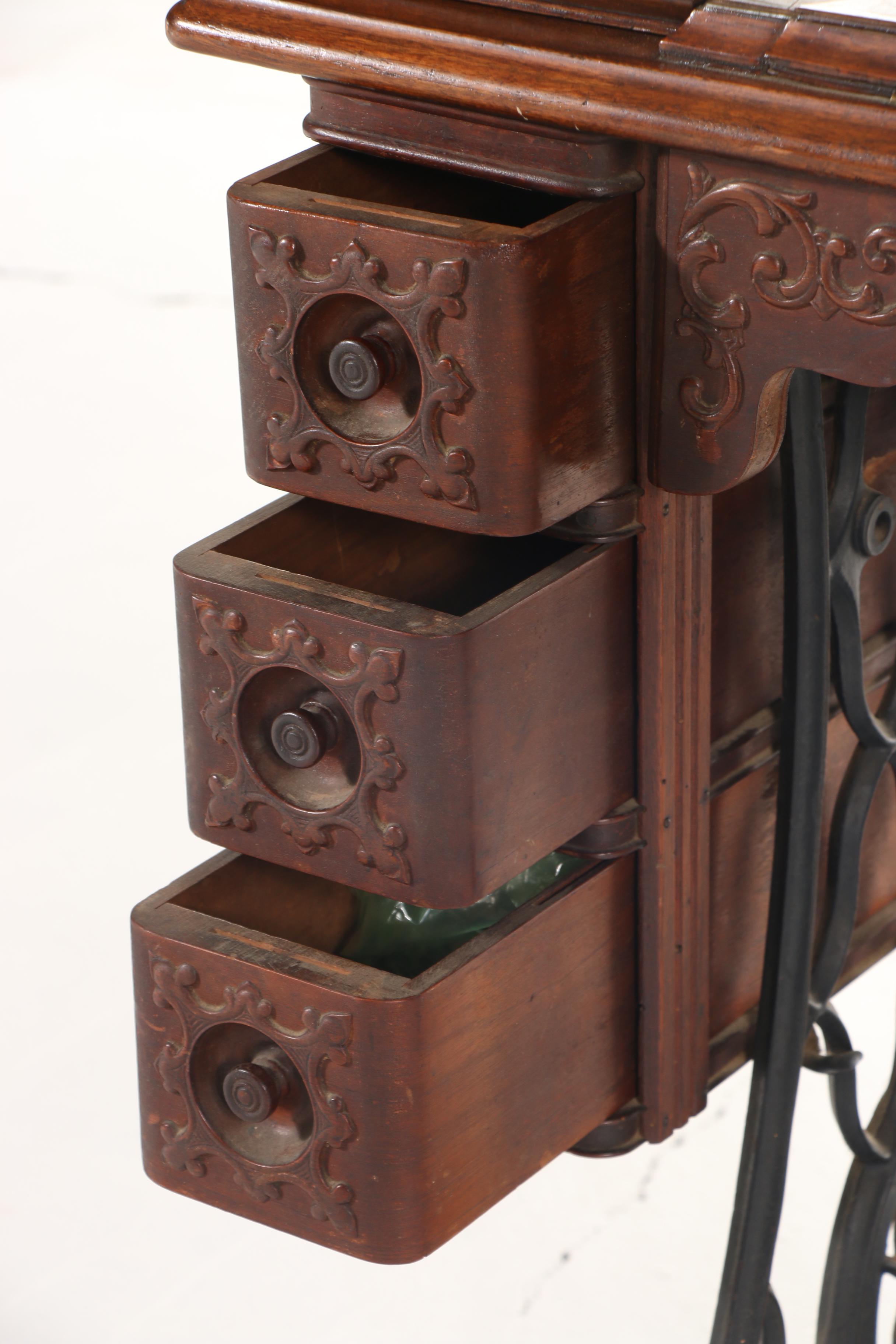 Singer Treadle Sewing Machine on Oak Cabinet, Early 20th Century