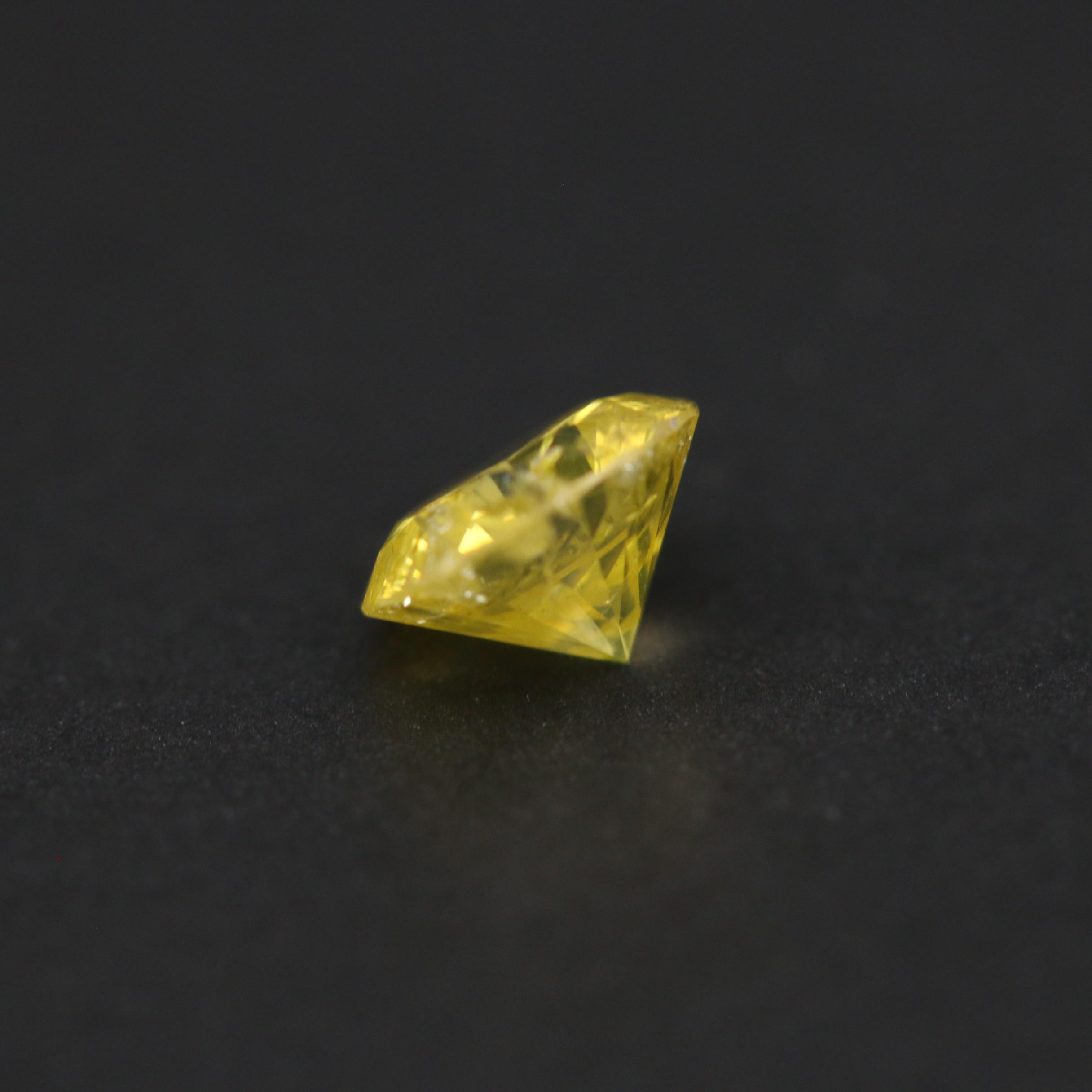 Loose 0.53 CT Fancy Vivid Yellow Diamond