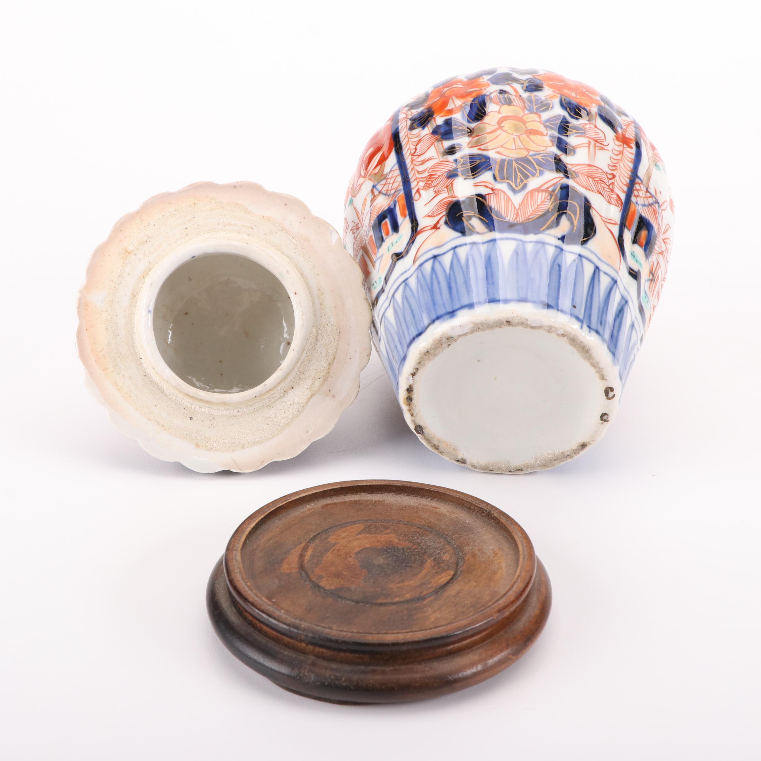 Japanese Imari and Kutani Porcelain Lidded Jars with Wood Bases