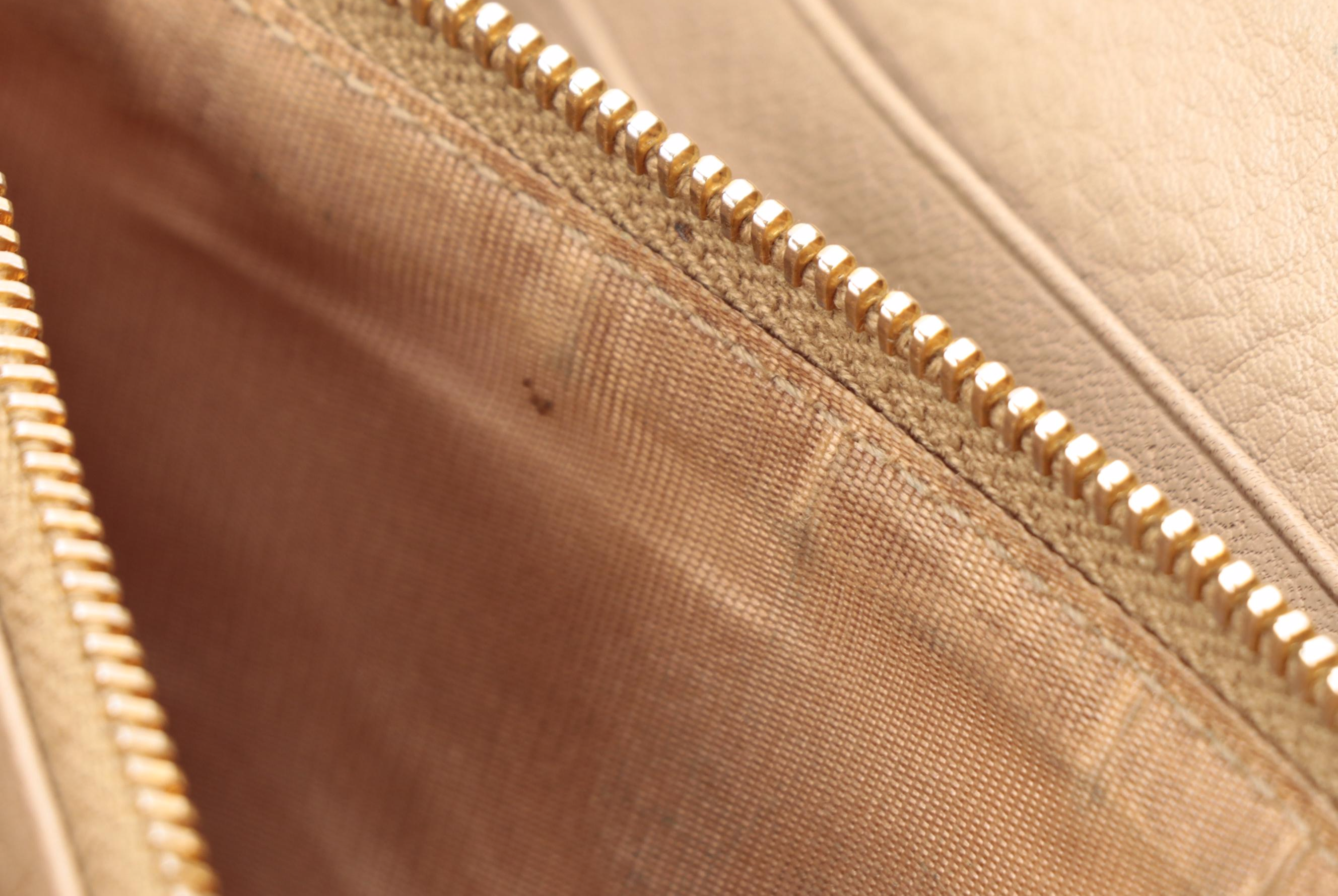 Prada Zip-Around Wallet in Beige Leather