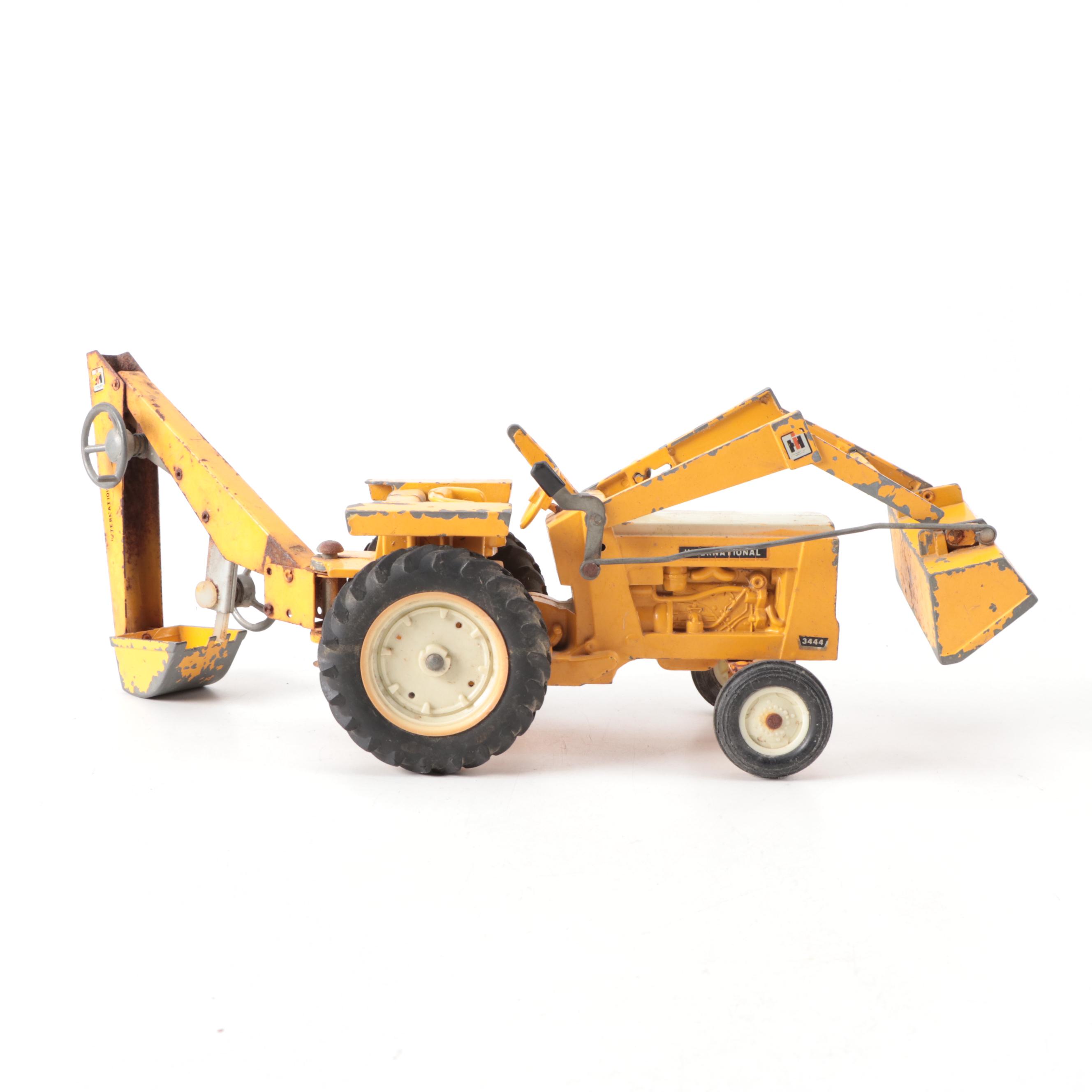 Ertl Pressed Steel International Harvester Earth Mover, Backhoe