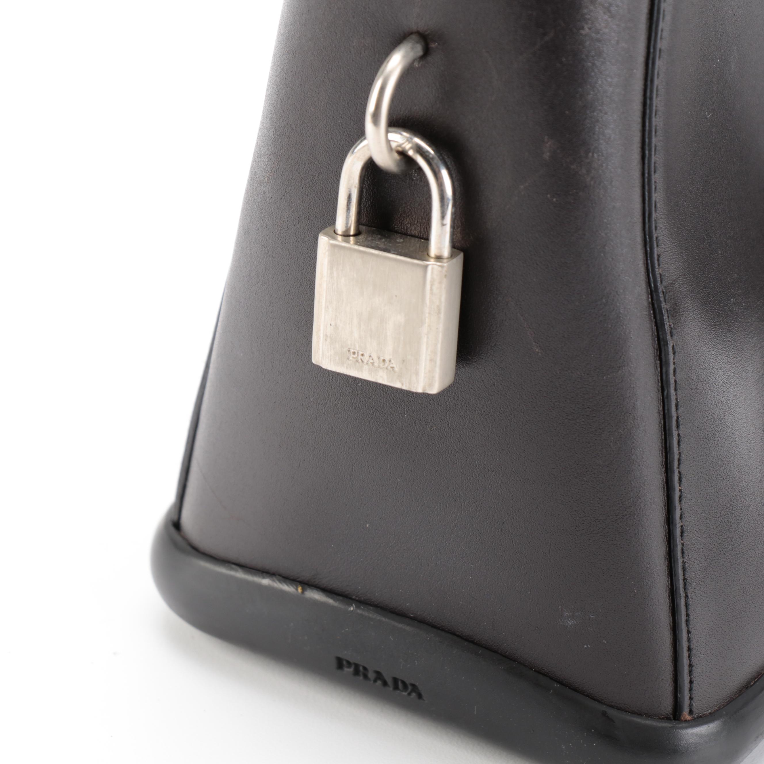 Prada Top Handle Bag in Vitello and Gomma Ebano Leather With Padlock and Key