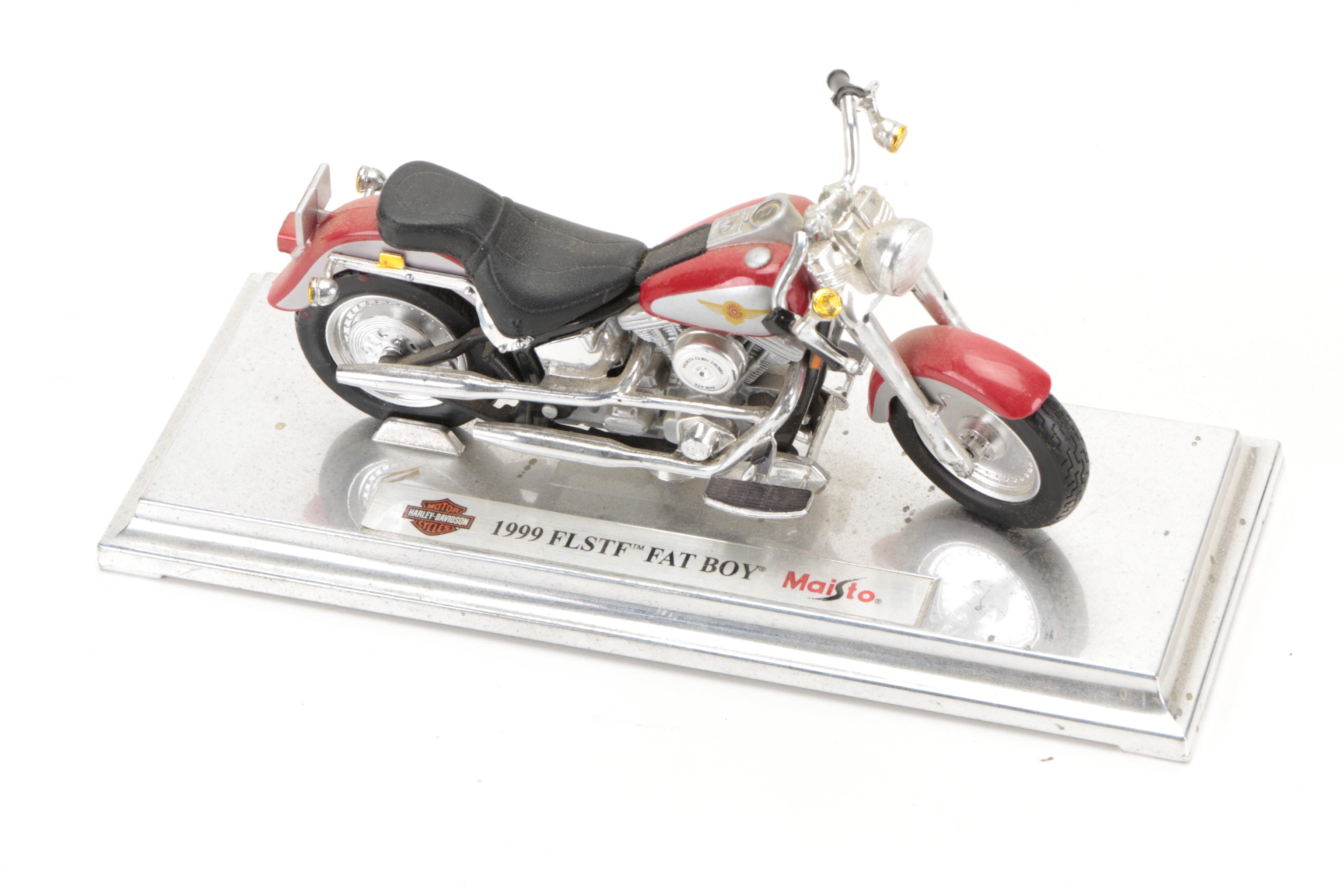 Maisto Motorcycle Model, Lionel Train Wrist Watch, Rumpke Model Truck, T-Shirt