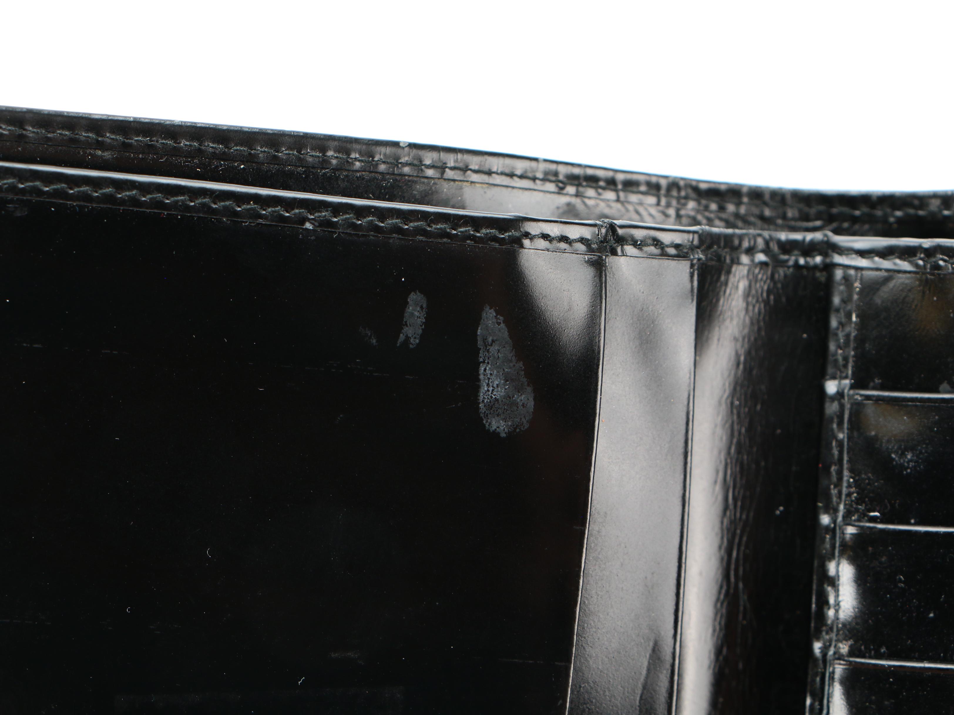 Prada Small Continental Wallet in Black Glazed Leather