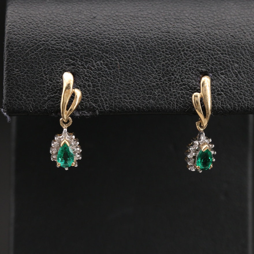 10K Emerald and 0.01 CTW Diamond Teardrop Earrings
