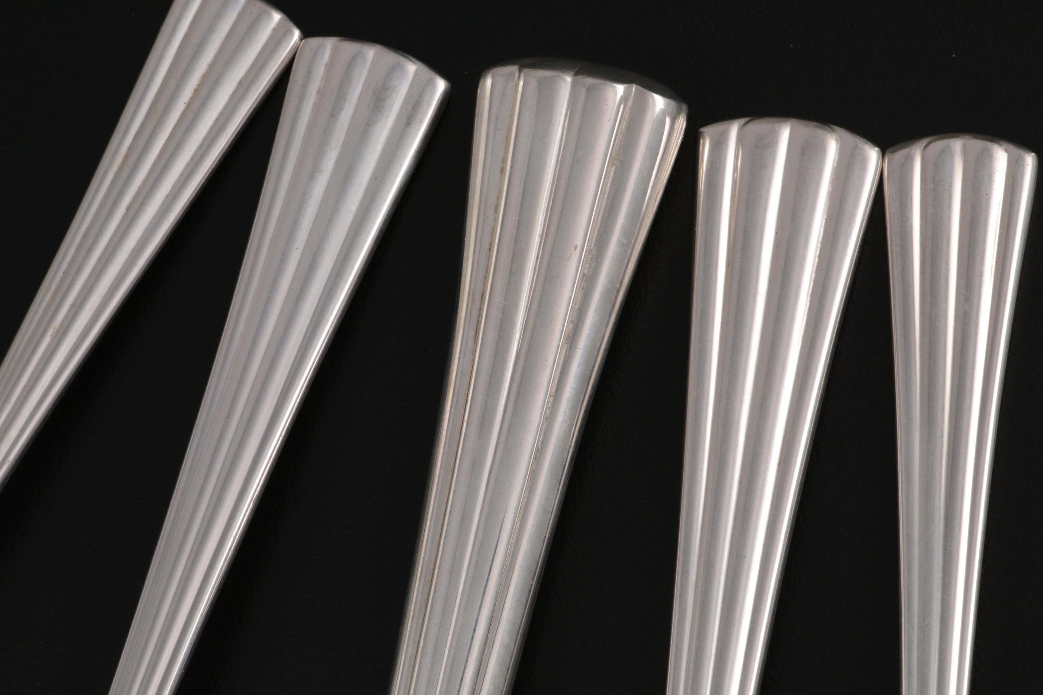 Cartier "Des Must" Sterling Silver Flatware, 20th Century