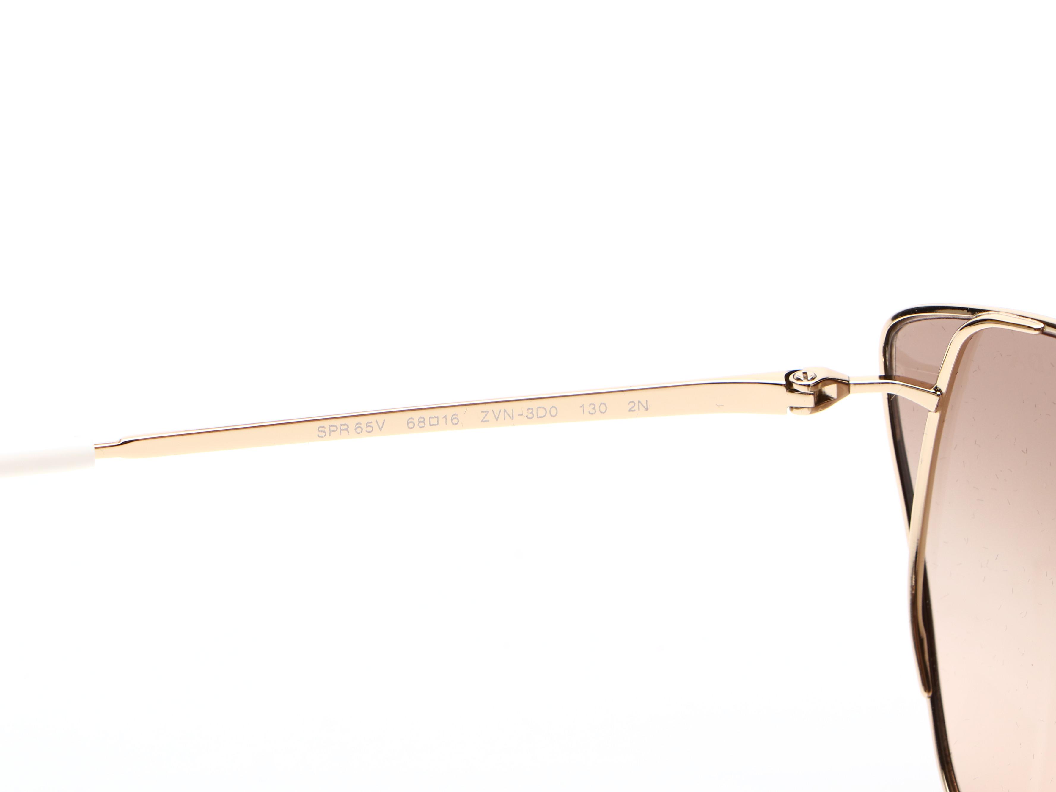 Prada SPR65V Modified Cate Eye Sunglasses with Case