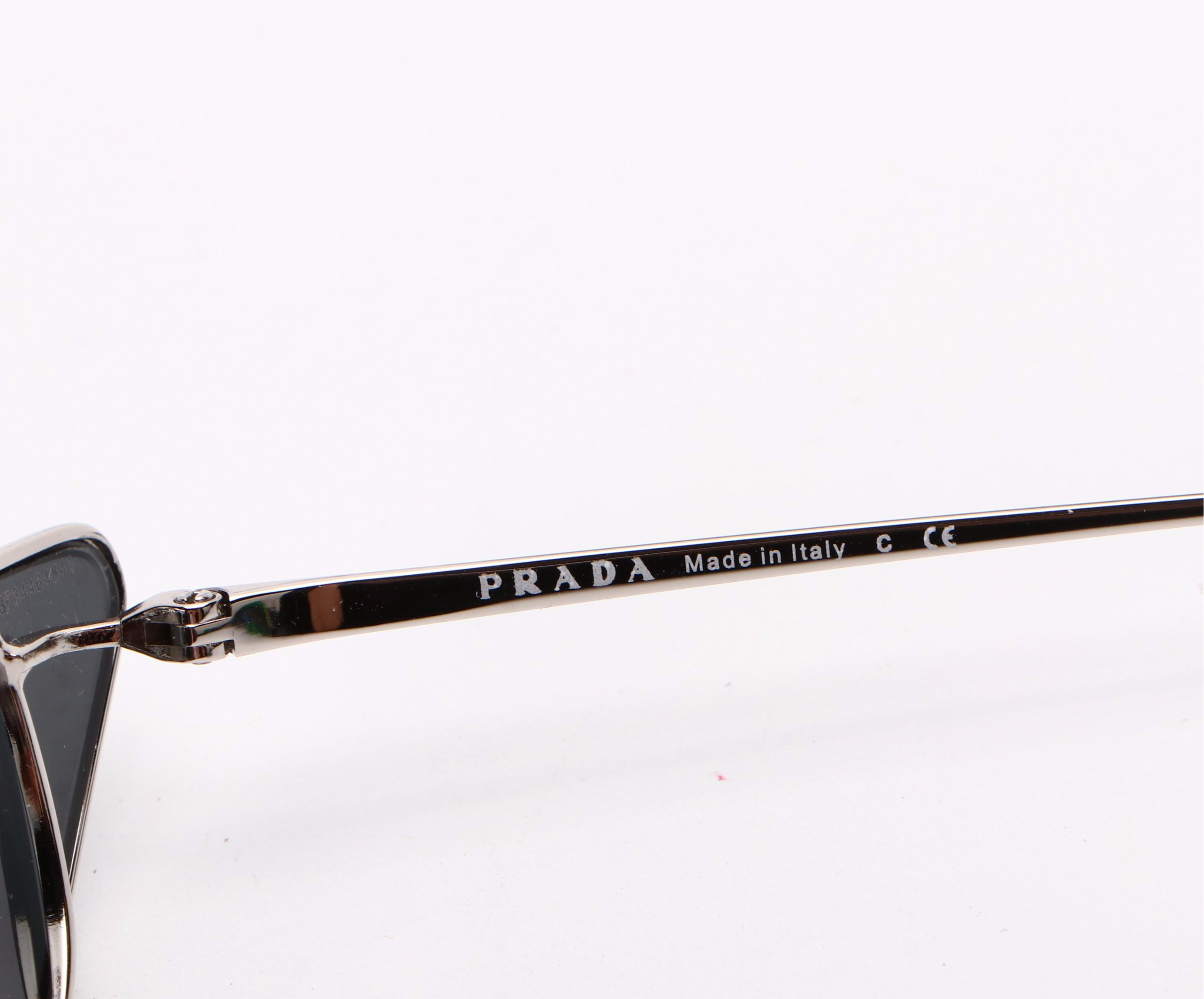 Prada SPR63U Cat Eye Metal Frame Sunglasses with Dark Grey Lenses