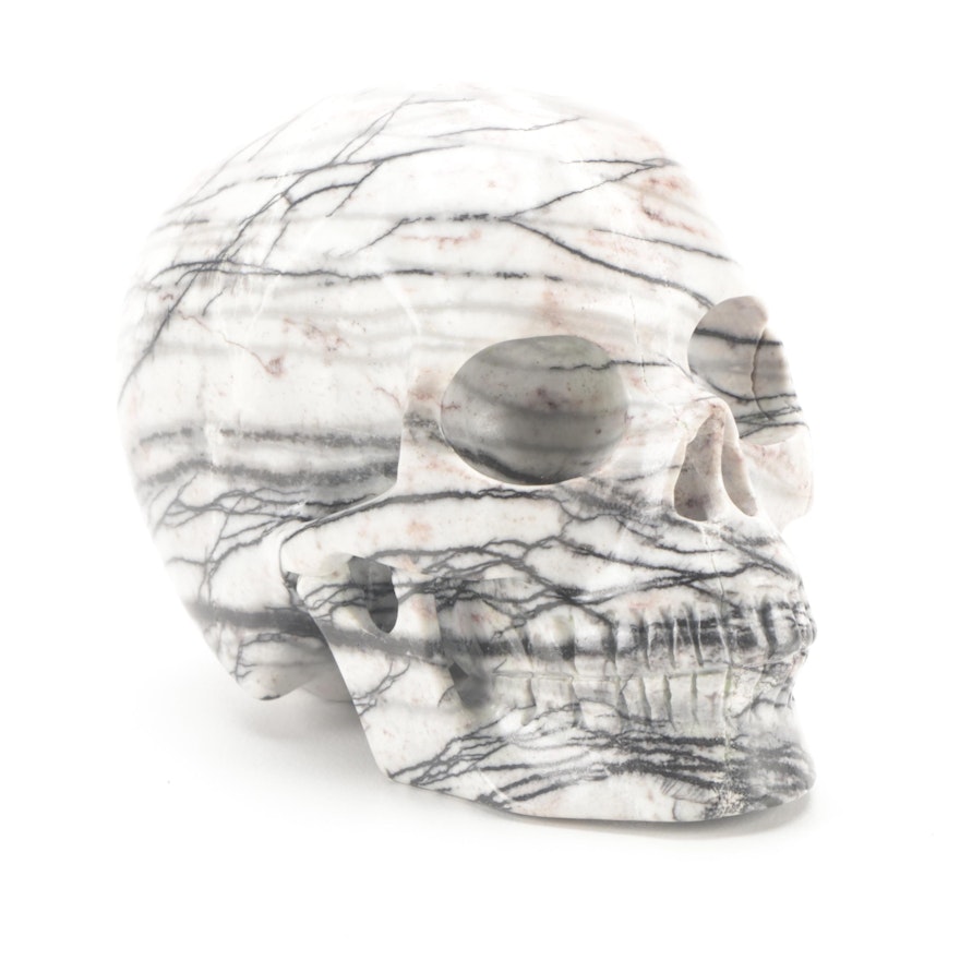 Carved Network Jasper Skull Figurine