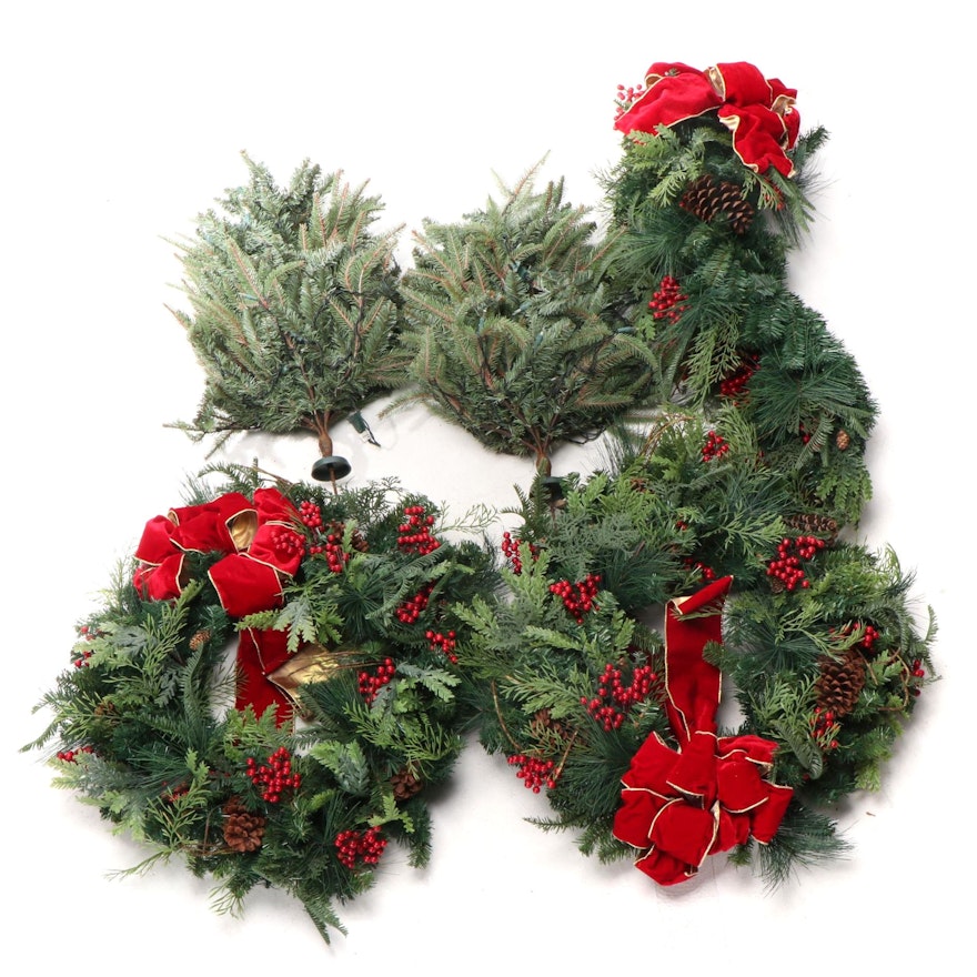 Frontgate Pre-Lit Outdoor Artificial Evergreen Garland, Trees, and Wreaths