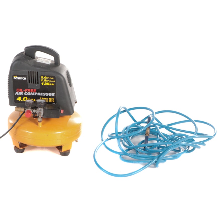 Bostitch 4 Gallon Oil-Free Pancake Air Compressor with Campbell Hausfeld Hose