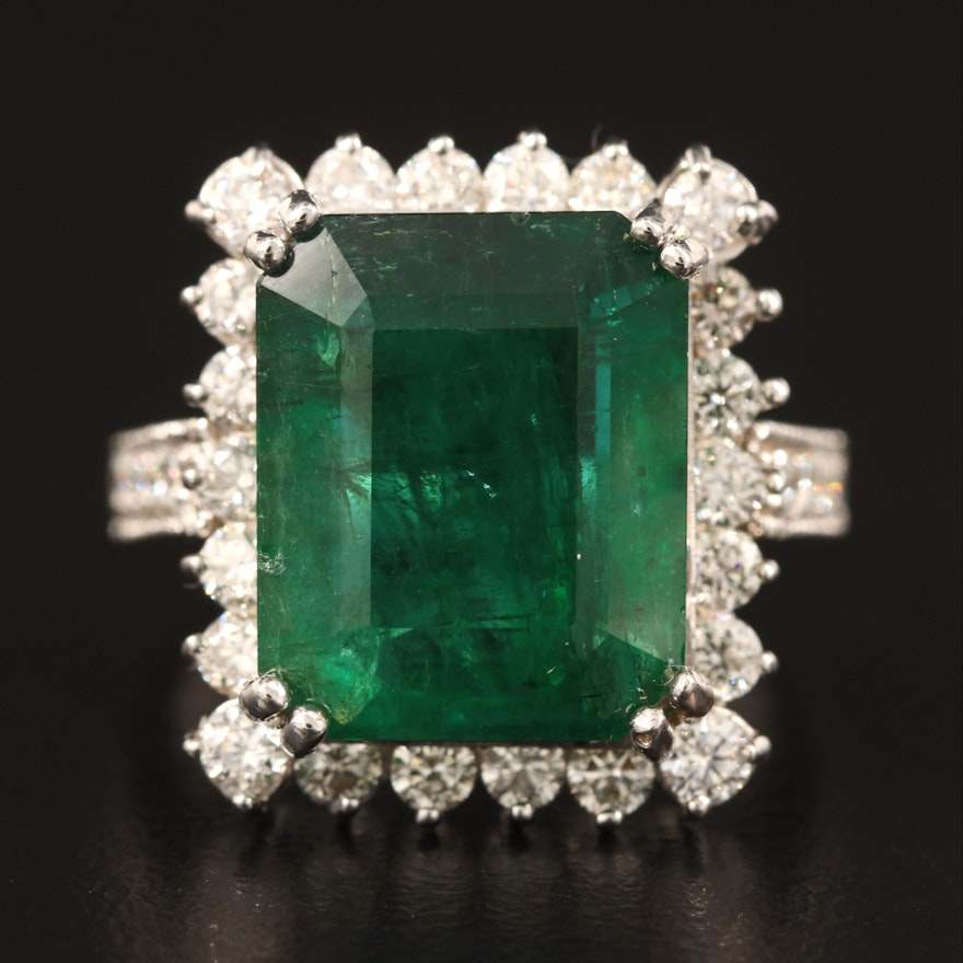 18K 7.58 CT Emerald and 1.50 CTW Diamond Halo Ring