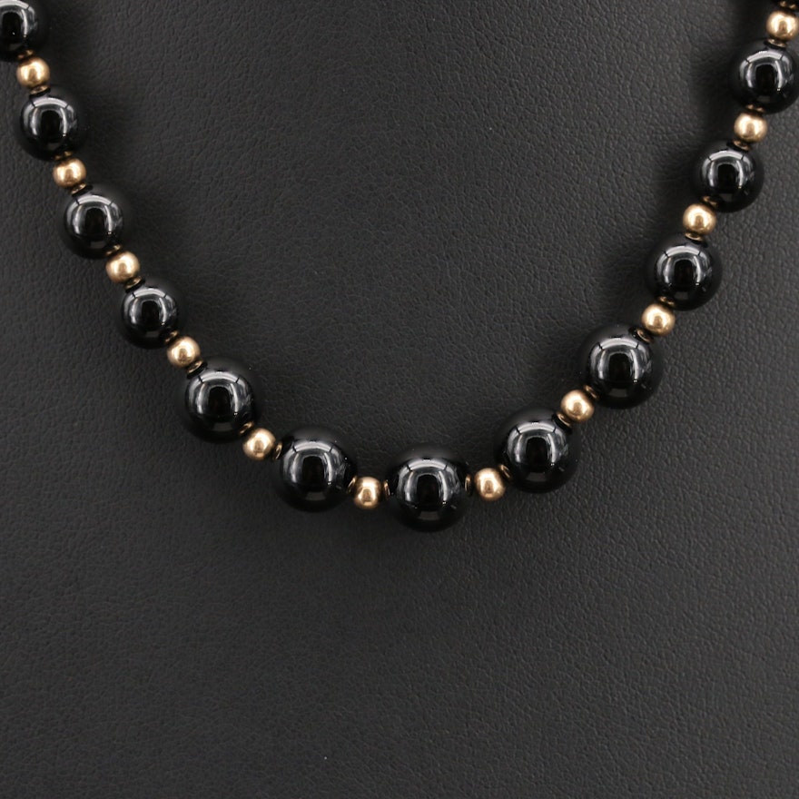 Graduated Black Onyx Beaded Necklace with 14K Gold Spacer Beads and Closure