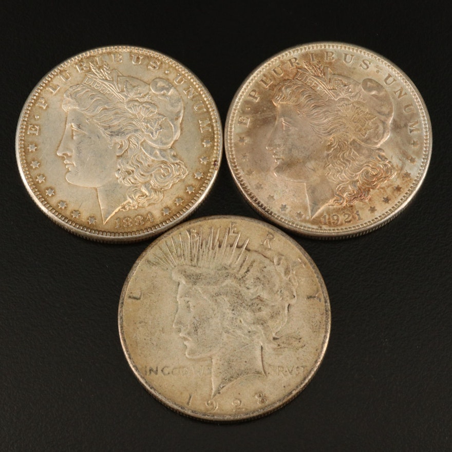 Two Morgan Silver Dollars and One Peace Silver Dollar