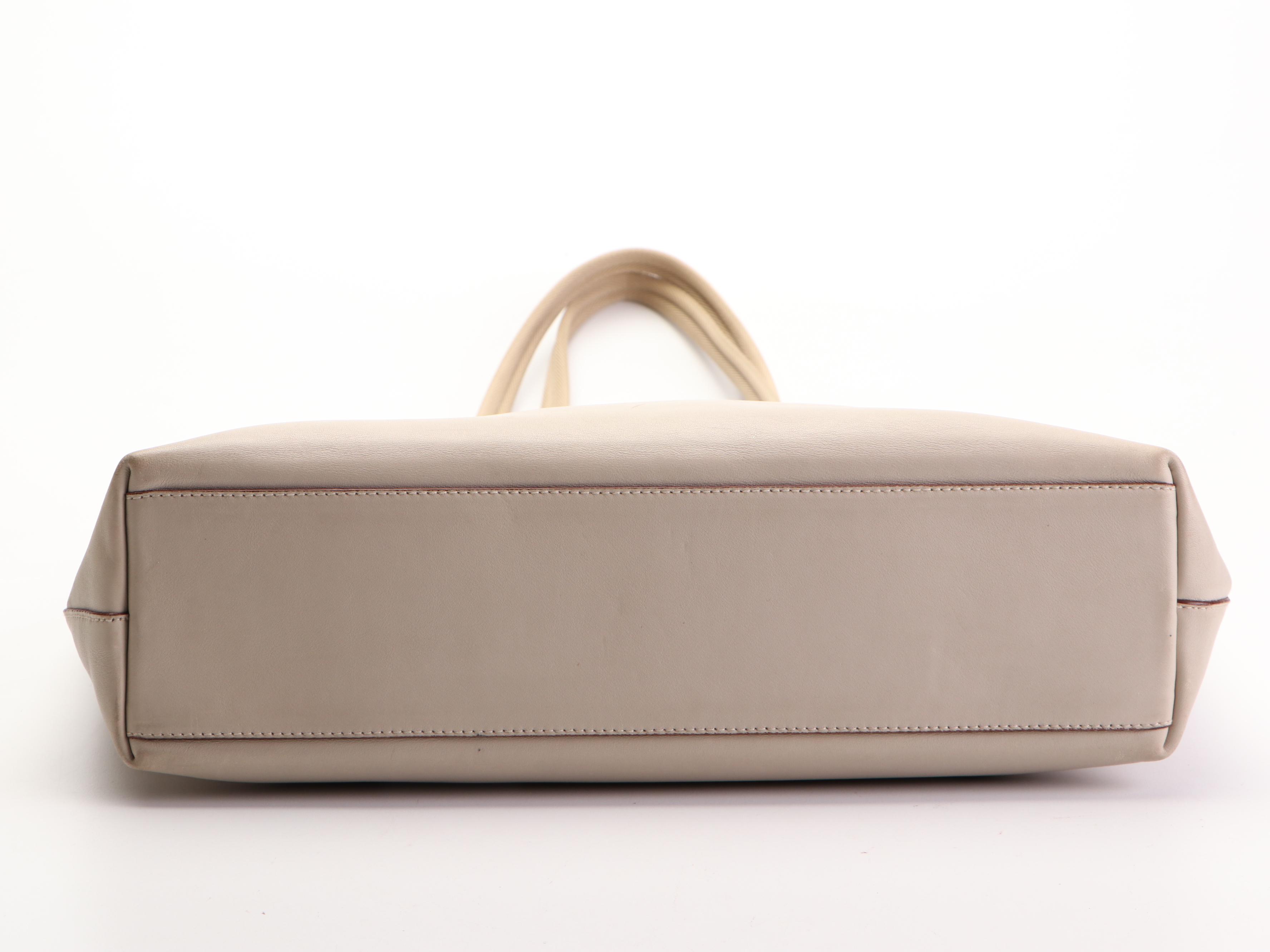 Prada Tote in Leather with Metal Circle Accents