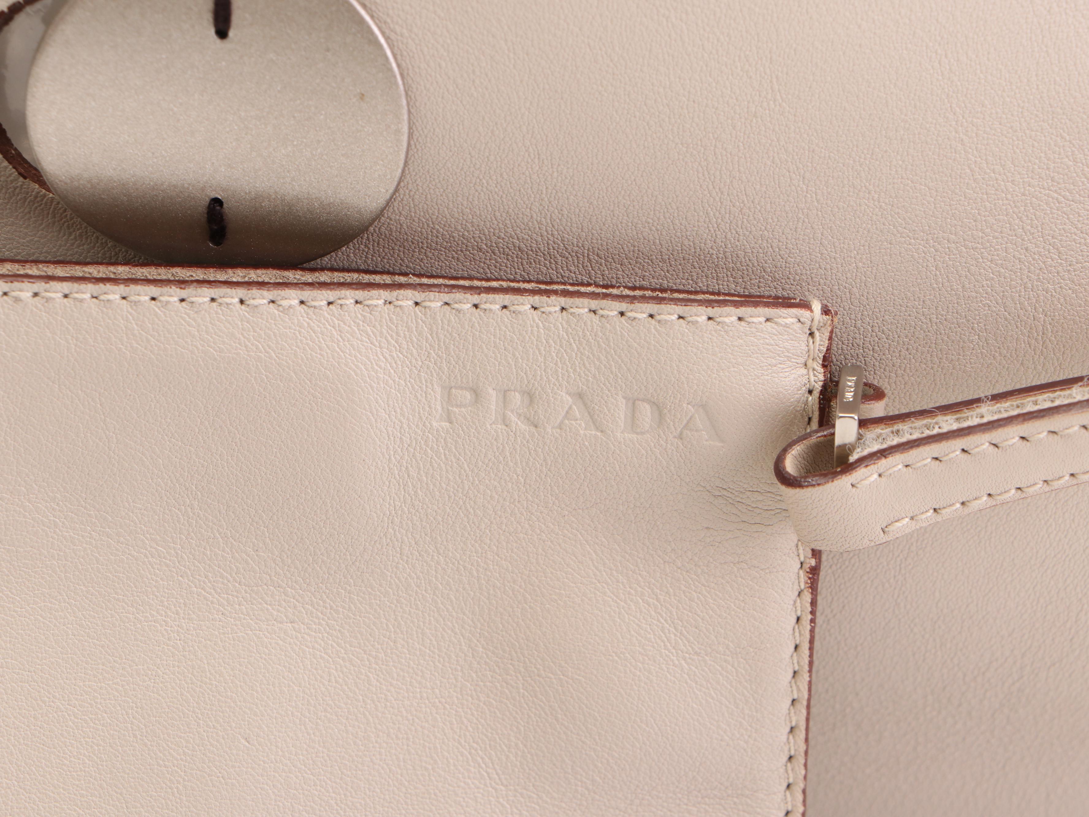 Prada Tote in Leather with Metal Circle Accents