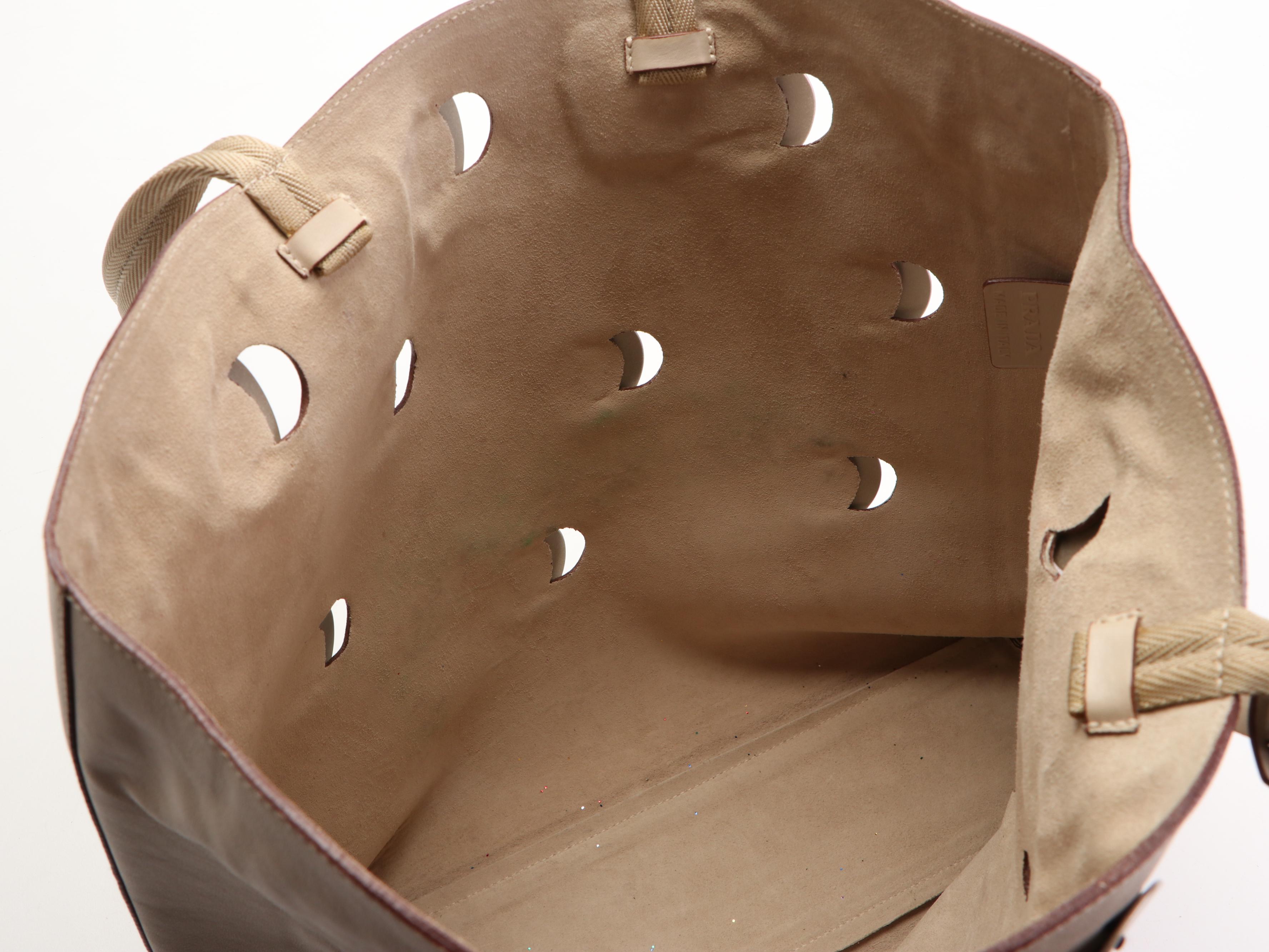 Prada Tote in Leather with Metal Circle Accents